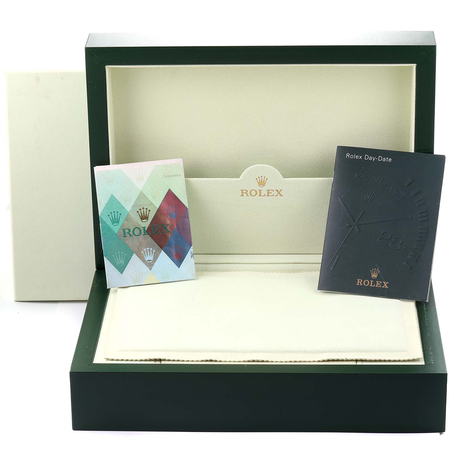 This image shows an open Rolex President 118348 Men
s Yellow Gold Mother of Pearl Dial 118348 Men
s Yellow Gold Mother of Pearl Dial watch box with booklets and a cloth.