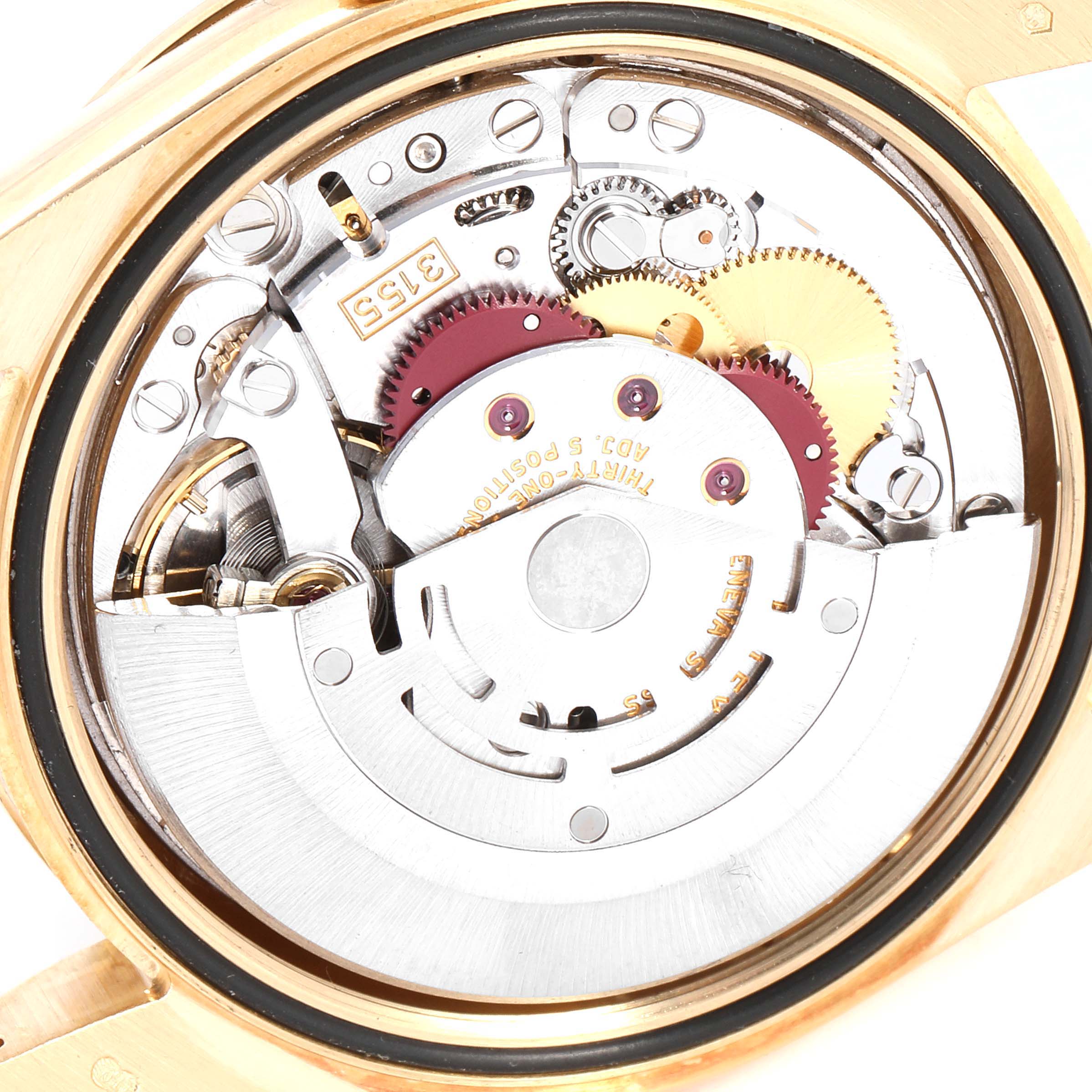 This image shows an internal view of the Rolex President 118348 Men
s Yellow Gold Mother of Pearl Dial 118348 Men
s Yellow Gold Mother of Pearl Dial model watch, highlighting its intricate mechanical components and movement.