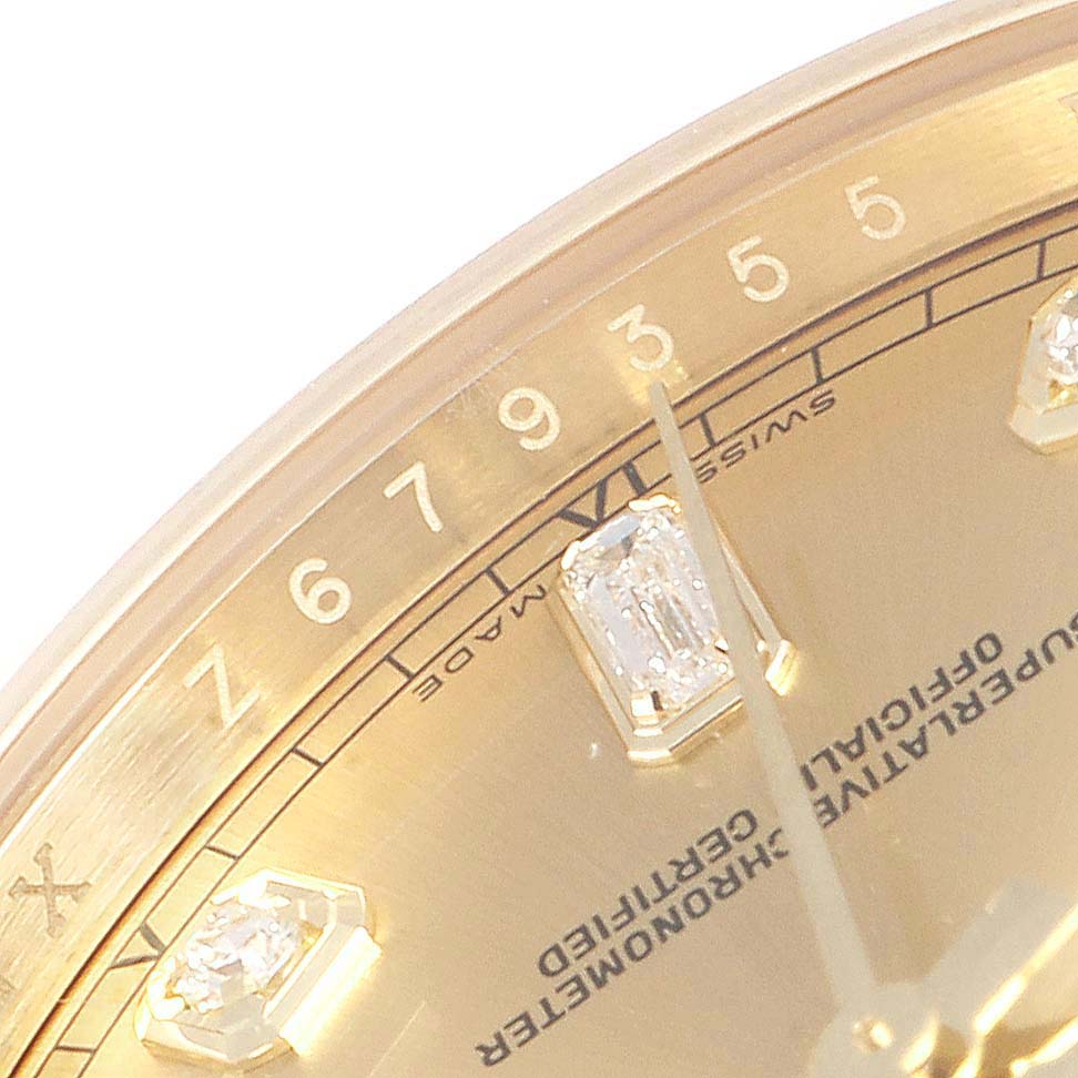 This image shows a close-up angle of the dial and bezel of the Rolex President 118348 Men
s Yellow Gold Mother of Pearl Dial 118348 Men
s Yellow Gold Mother of Pearl Dial model, highlighting the diamond hour markers and numerals.