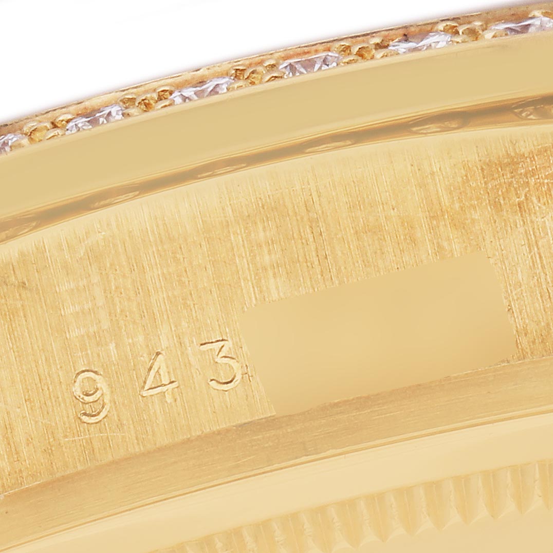 The image shows a close-up of the engraved case edge of a Rolex President 18048 Men's Yellow Gold Champagne Dial 18048 Men's Yellow Gold Champagne Dial model, highlighting part of the serial number.