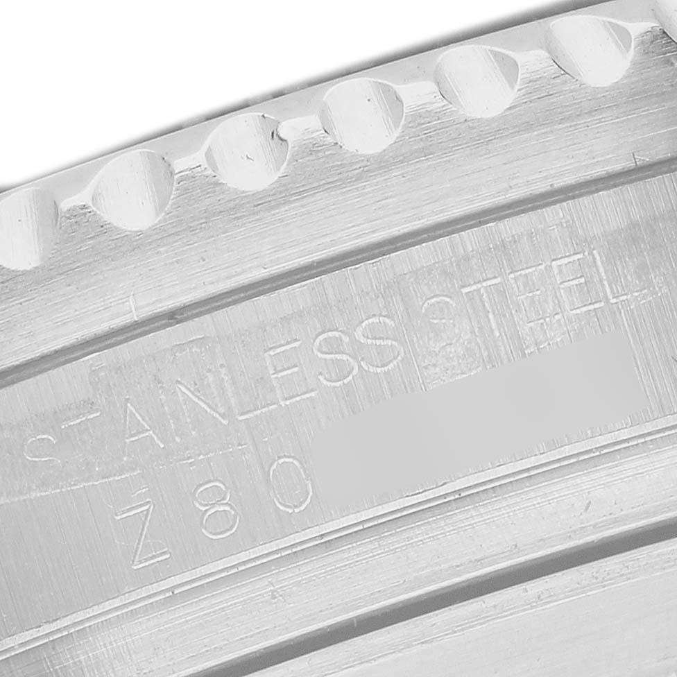 The image shows a close-up of the inner bezel with engraving, focusing on the material of the Rolex Sea-Dweller M16600T Men's Stainless Steel Black Dial.