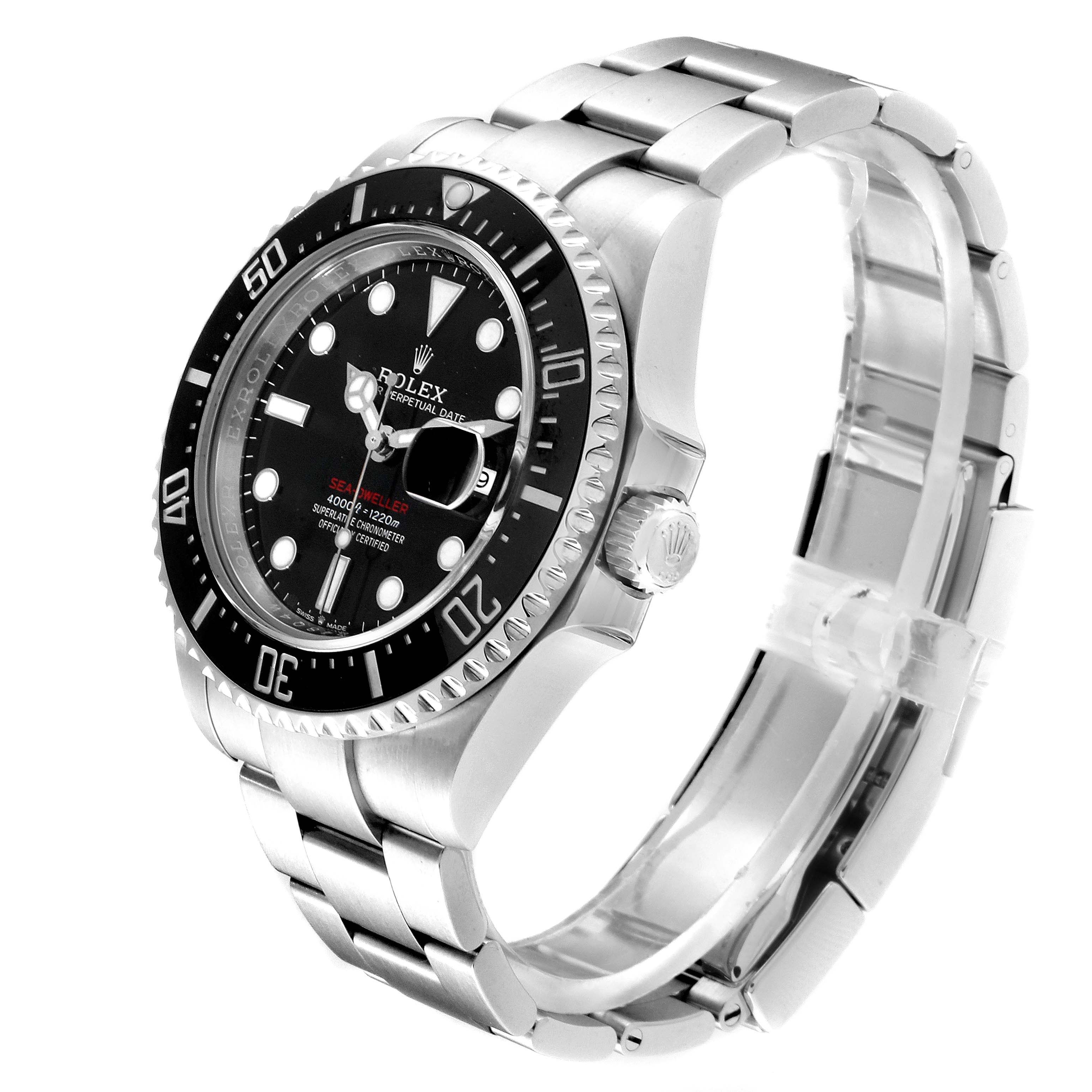 The image shows a Rolex Sea-Dweller 126600 Men
s Stainless Steel Black Dial 126600 Men
s Stainless Steel Black Dial watch at a slightly angled side view, highlighting the black dial, bezel, and silver bracelet.