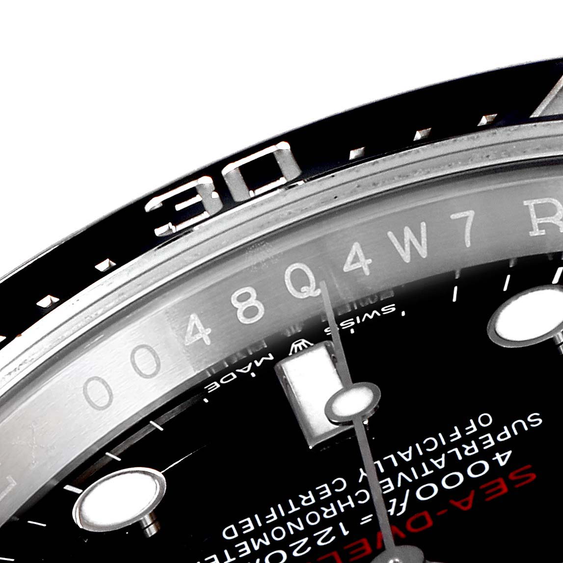 The image shows a close-up of the dial and bezel of a Rolex Sea-Dweller 126600 Men
s Stainless Steel Black Dial 126600 Men
s Stainless Steel Black Dial watch, focusing on the "30" marker and part of the inscriptions.