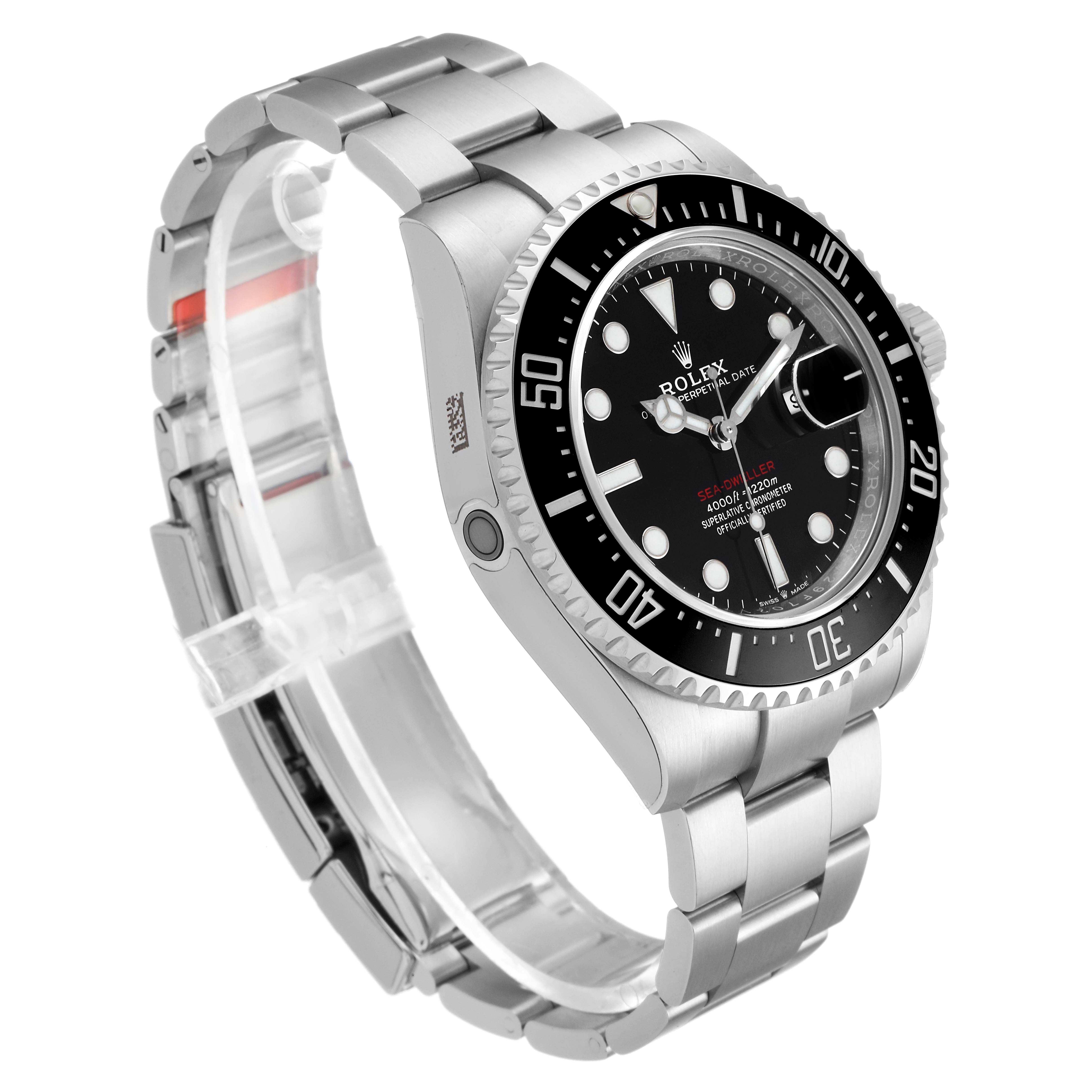 This image shows the Rolex Sea-Dweller 126600 Men
s Stainless Steel Black Dial 126600 Men
s Stainless Steel Black Dial watch at an angle highlighting the face, bezel, and part of the metal bracelet.