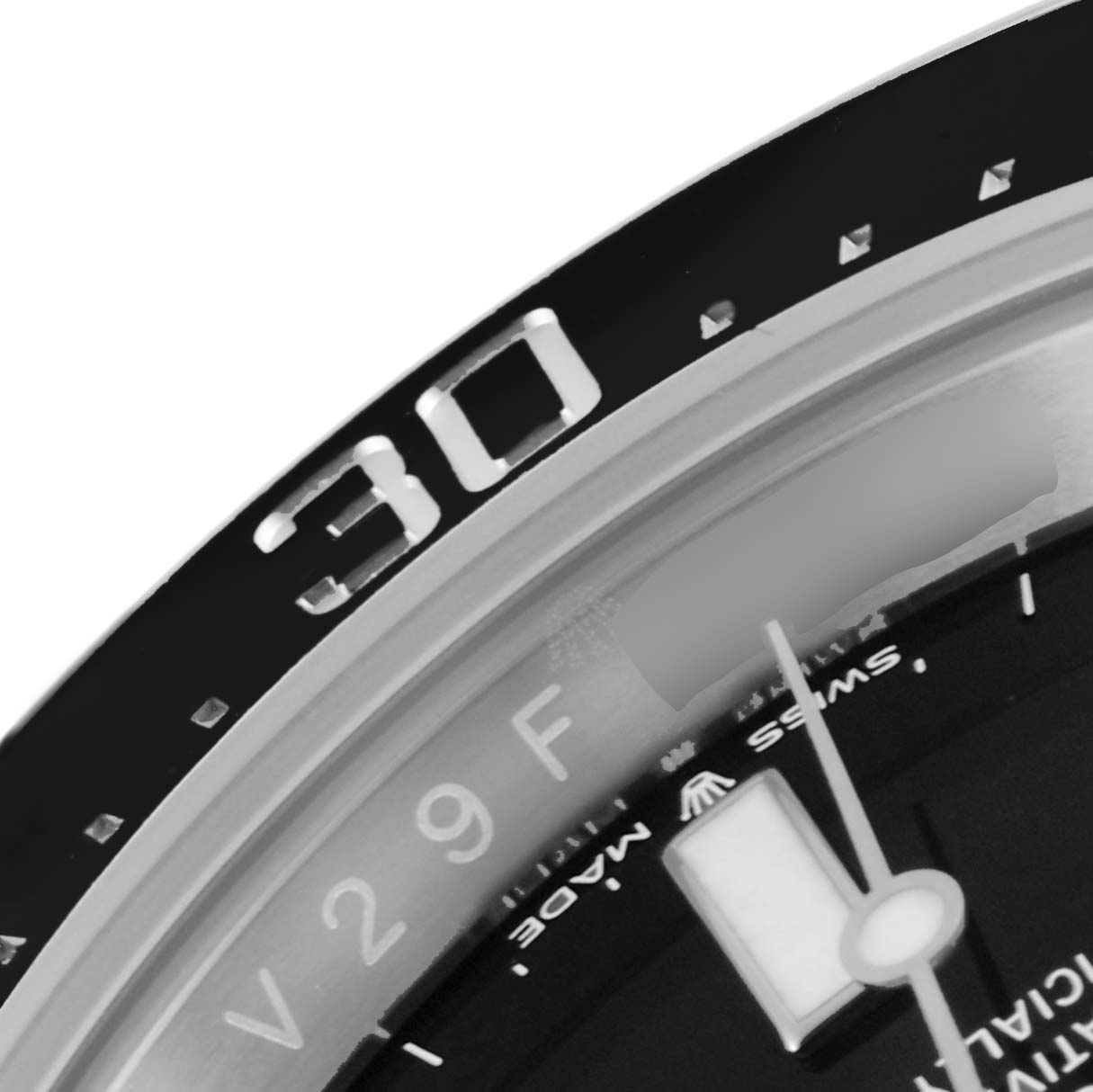 The image shows a close-up of the bezel and part of the dial of a Rolex Sea-Dweller 126600 Men
s Stainless Steel Black Dial 126600 Men
s Stainless Steel Black Dial watch.