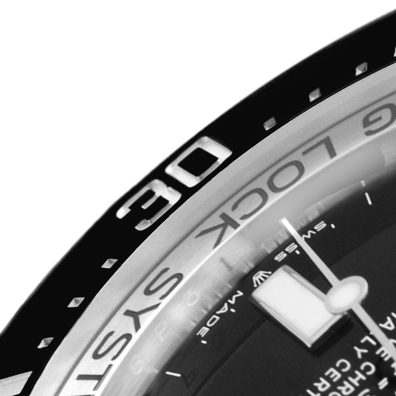 The image shows a close-up of the bezel and part of the dial of a Rolex Sea-Dweller 126660 Men
s Stainless Steel Black Dial 126660 Men
s Stainless Steel Black Dial watch.