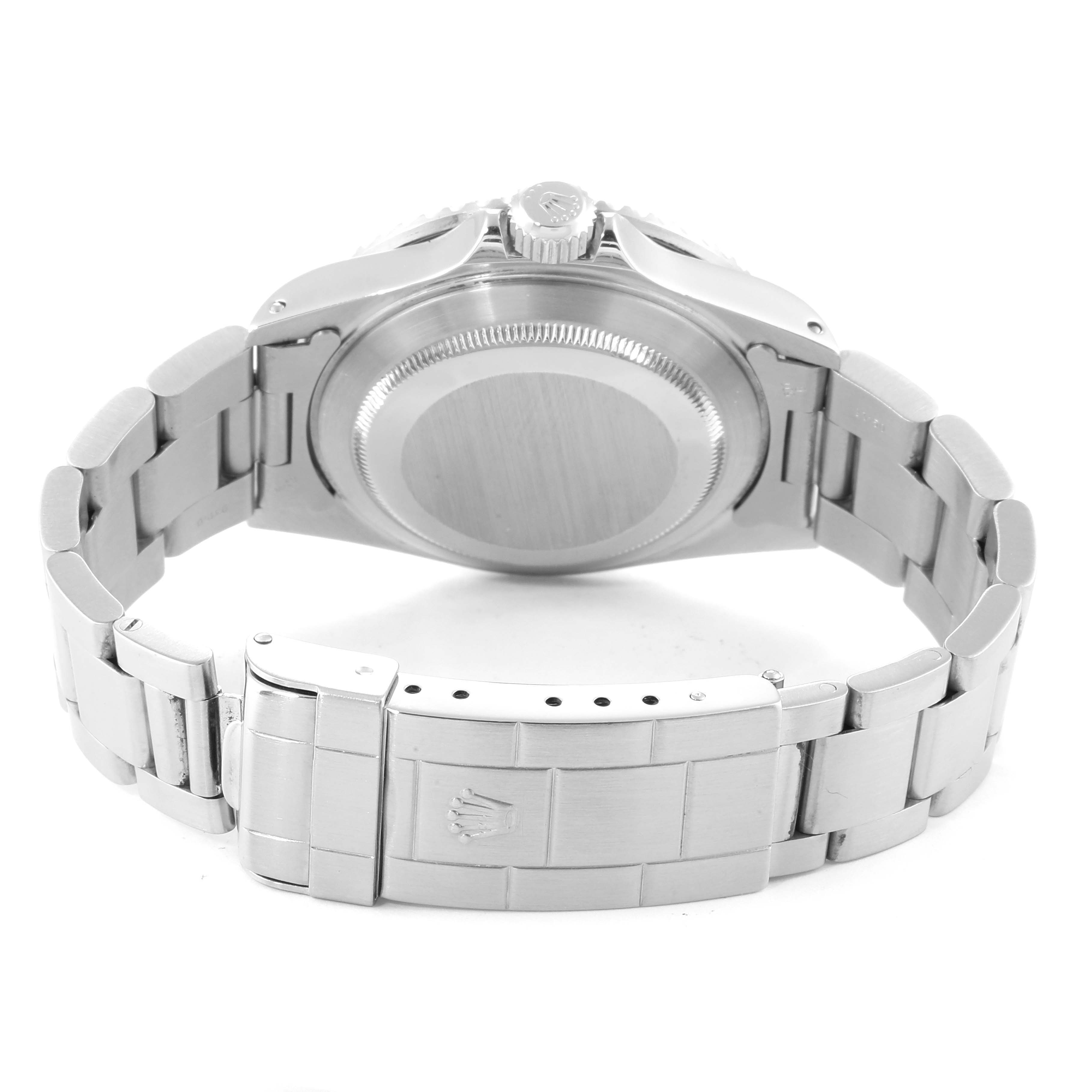 The image shows the back and bracelet of a Rolex Submariner 16610 Men
s Stainless Steel Black Dial 16610 Men
s Stainless Steel Black Dial watch from a slightly elevated rear angle.