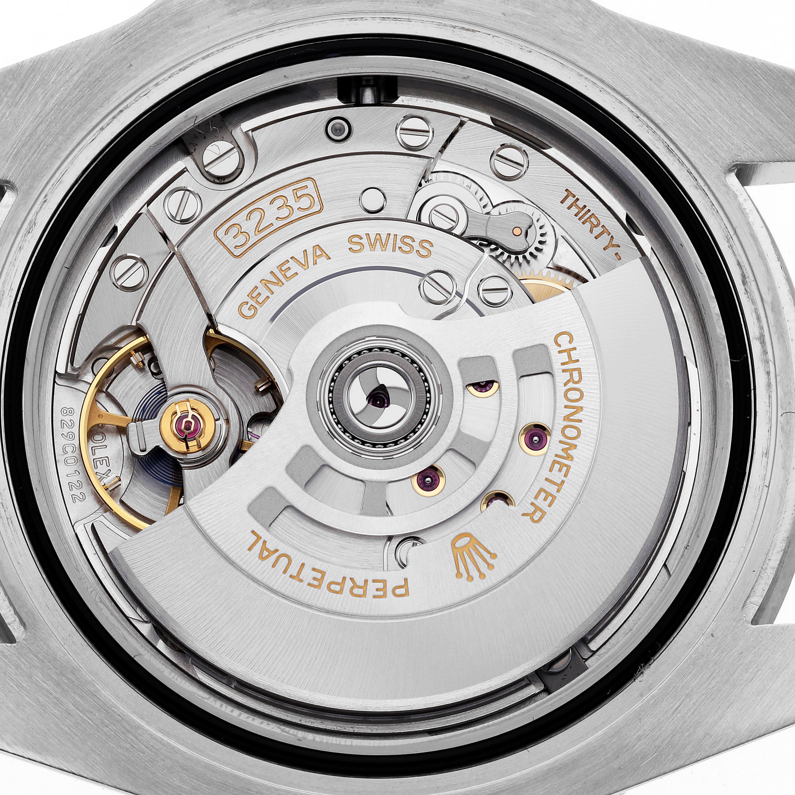 This image shows the movement of a Rolex Submariner 126610LN Men's Stainless Steel Black Dial 126610LN Men's Stainless Steel Black Dial watch from a top-down angle, highlighting the inner mechanisms and rotor.