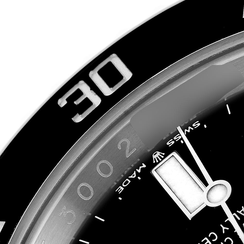 The image shows a close-up of the bezel and dial of a Rolex Submariner 126610LN Men's Stainless Steel Black Dial 126610LN Men's Stainless Steel Black Dial, focusing on the minute hand and 30-minute marker.