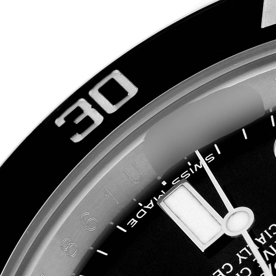 This image shows a close-up of the dial, bezel, and minute hand of a Rolex Submariner 116610LN Men
s Stainless Steel Black Dial 116610LN Men
s Stainless Steel Black Dial watch, particularly focusing on the "30" marker.