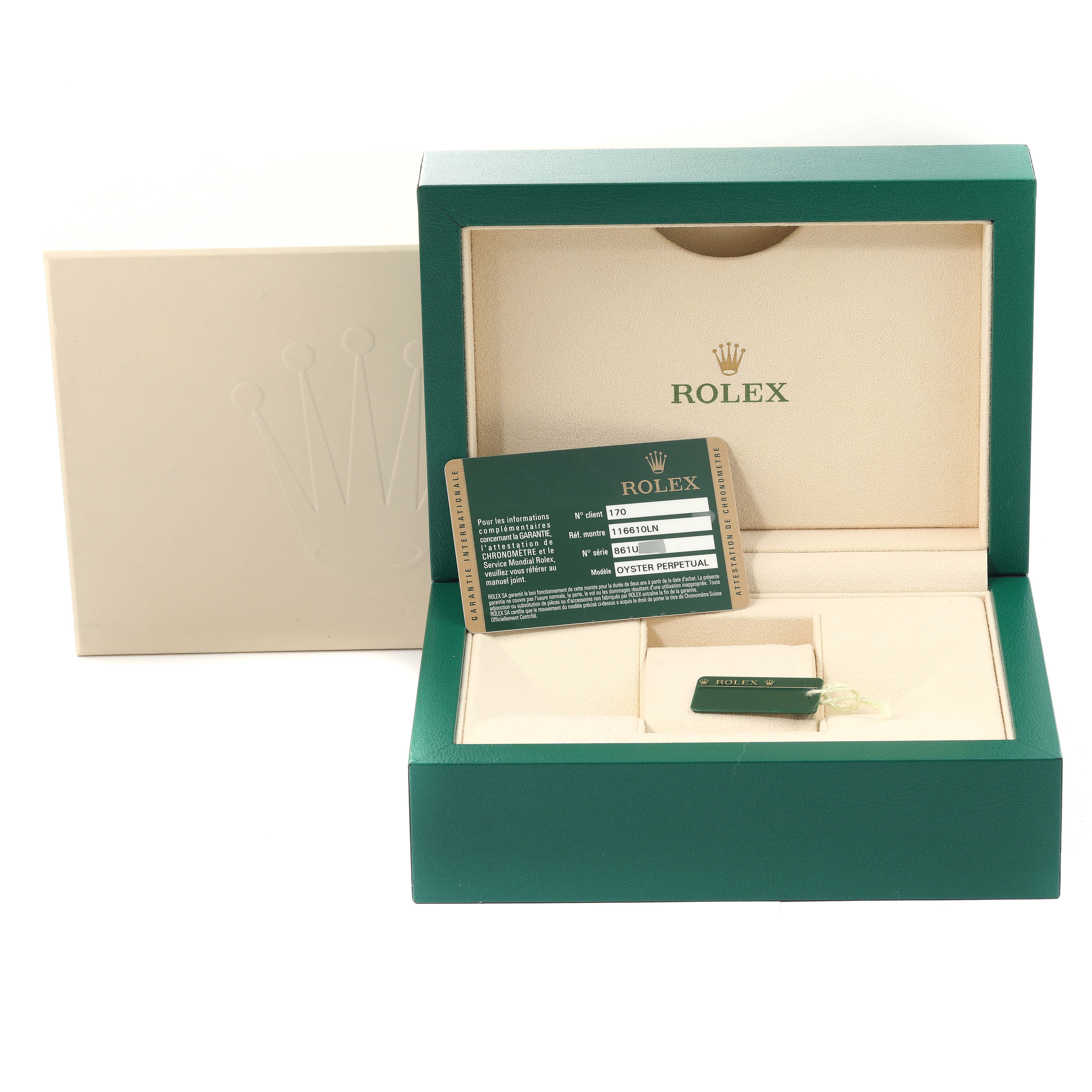 This image shows the open box and warranty card for a Rolex Submariner 116610LN Men
s Stainless Steel Black Dial 116610LN Men
s Stainless Steel Black Dial watch.