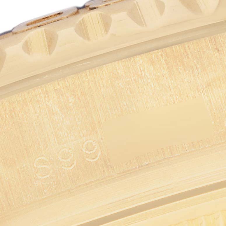 This close-up image shows the side and part of the bezel of the Rolex Yacht-Master 69628 Women's Yellow Gold Blue Dial 69628 Women's Yellow Gold Blue Dial watch.