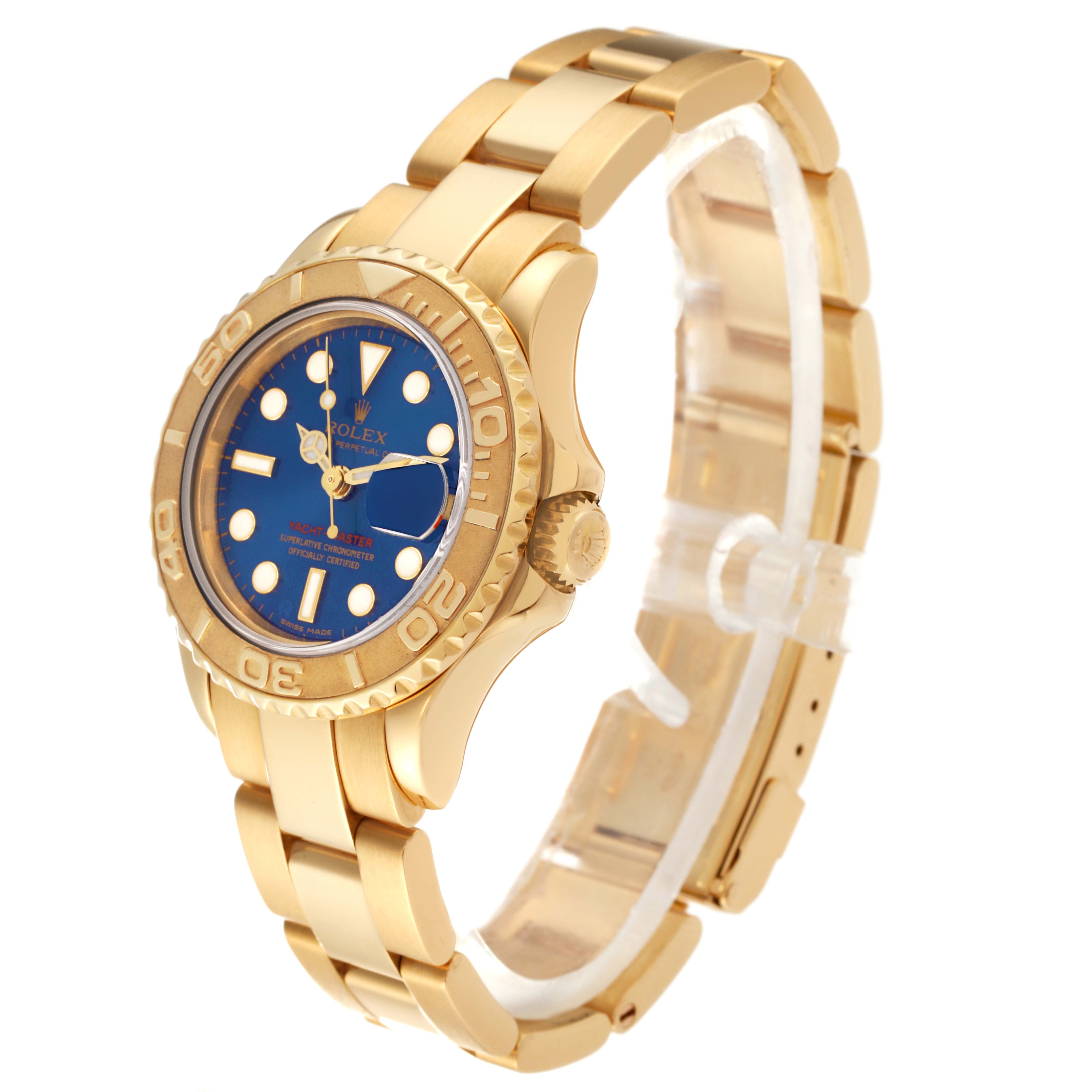 The image shows a side view of a Rolex Yacht-Master 69628 Women's Yellow Gold Blue Dial 69628 Women's Yellow Gold Blue Dial watch, highlighting its gold case, blue dial, and bracelet.