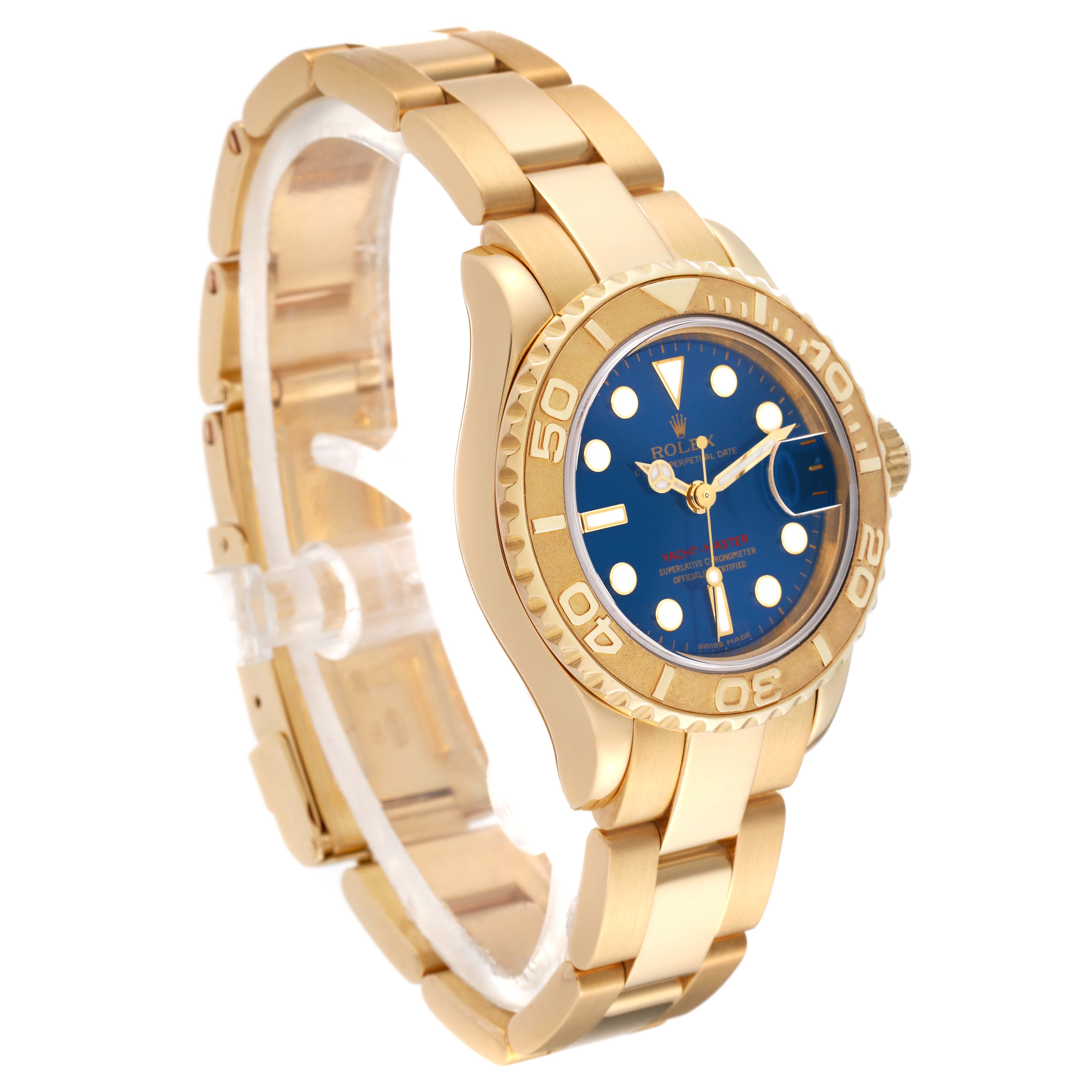 This image shows a side angle of the Rolex Yacht-Master 69628 Women's Yellow Gold Blue Dial 69628 Women's Yellow Gold Blue Dial watch, highlighting its gold bracelet, blue dial, and bezel.
