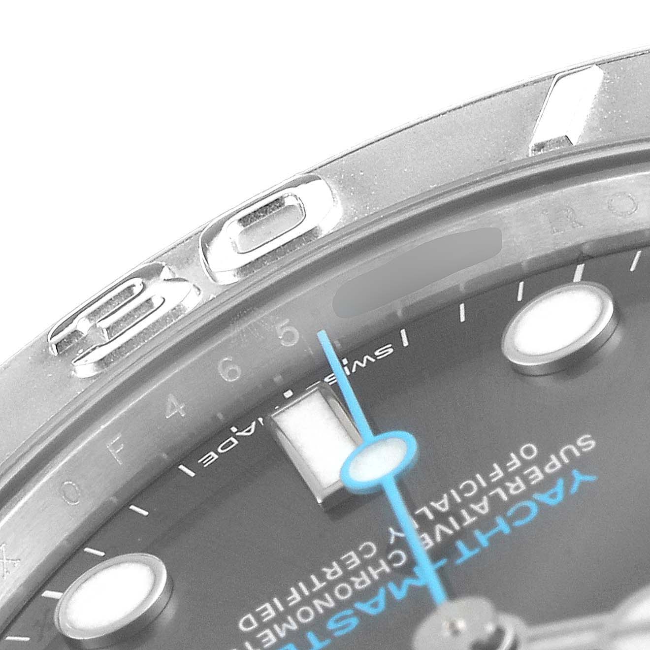 The image shows a partial close-up of the bezel, dial, and blue second hand of the Rolex Yacht-Master 268622 Men
s Stainless Steel Grey Dial 268622 Men
s Stainless Steel Grey Dial watch.
