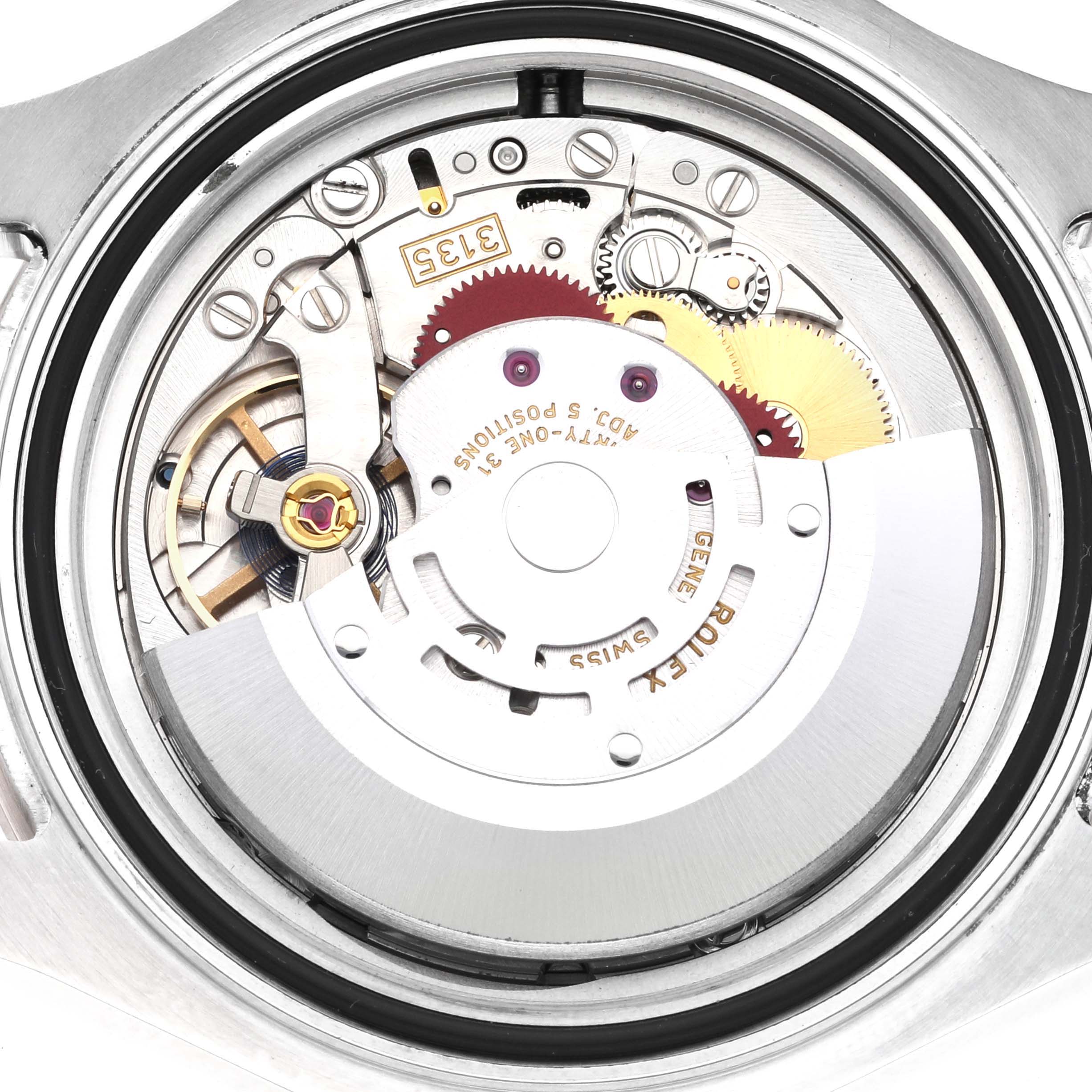 This image shows the underside of the Rolex Yacht-Master 116621 Men's Steel and Gold (two tone) Brown Dial 116621 Men's Steel and Gold (two tone) Brown Dial watch, revealing its intricate movement mechanism.