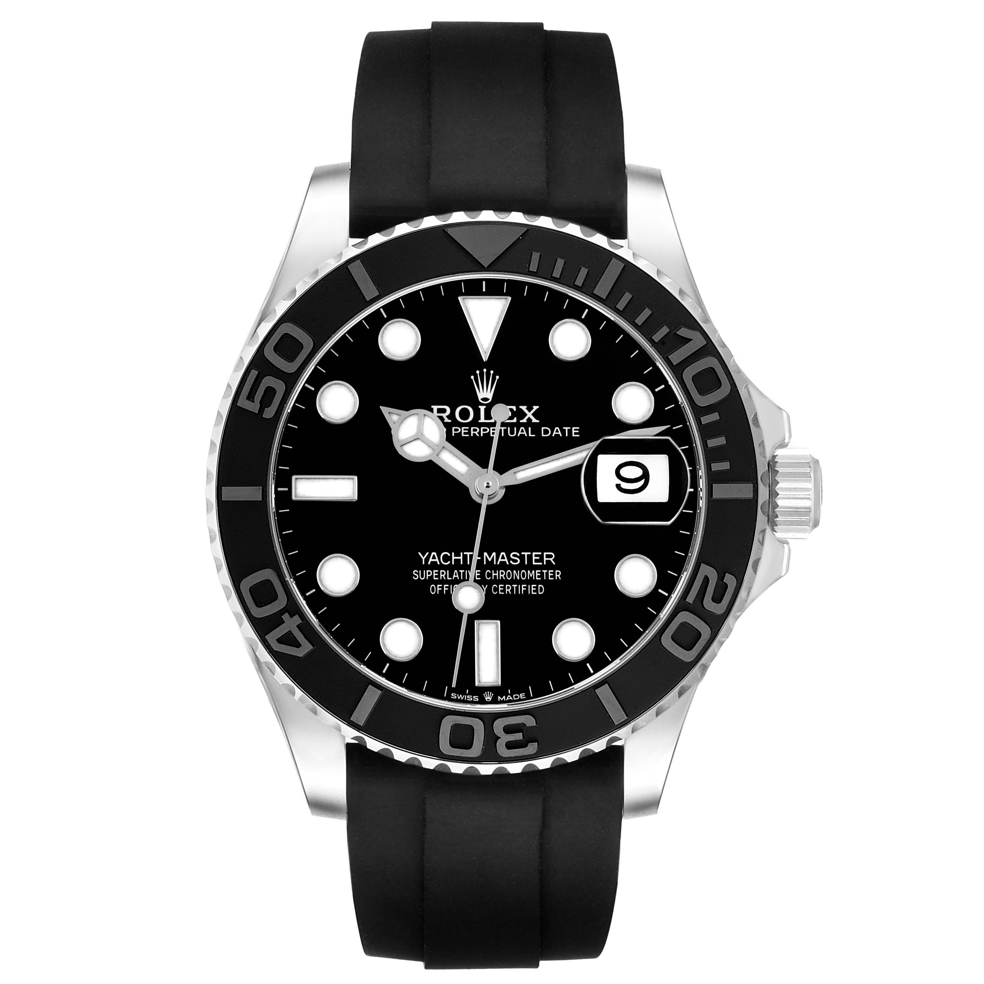 The Rolex Yacht-Master 226659 Men's White Gold Black Dial watch is shown from the front, highlighting its black dial, bezel, and rubber strap.