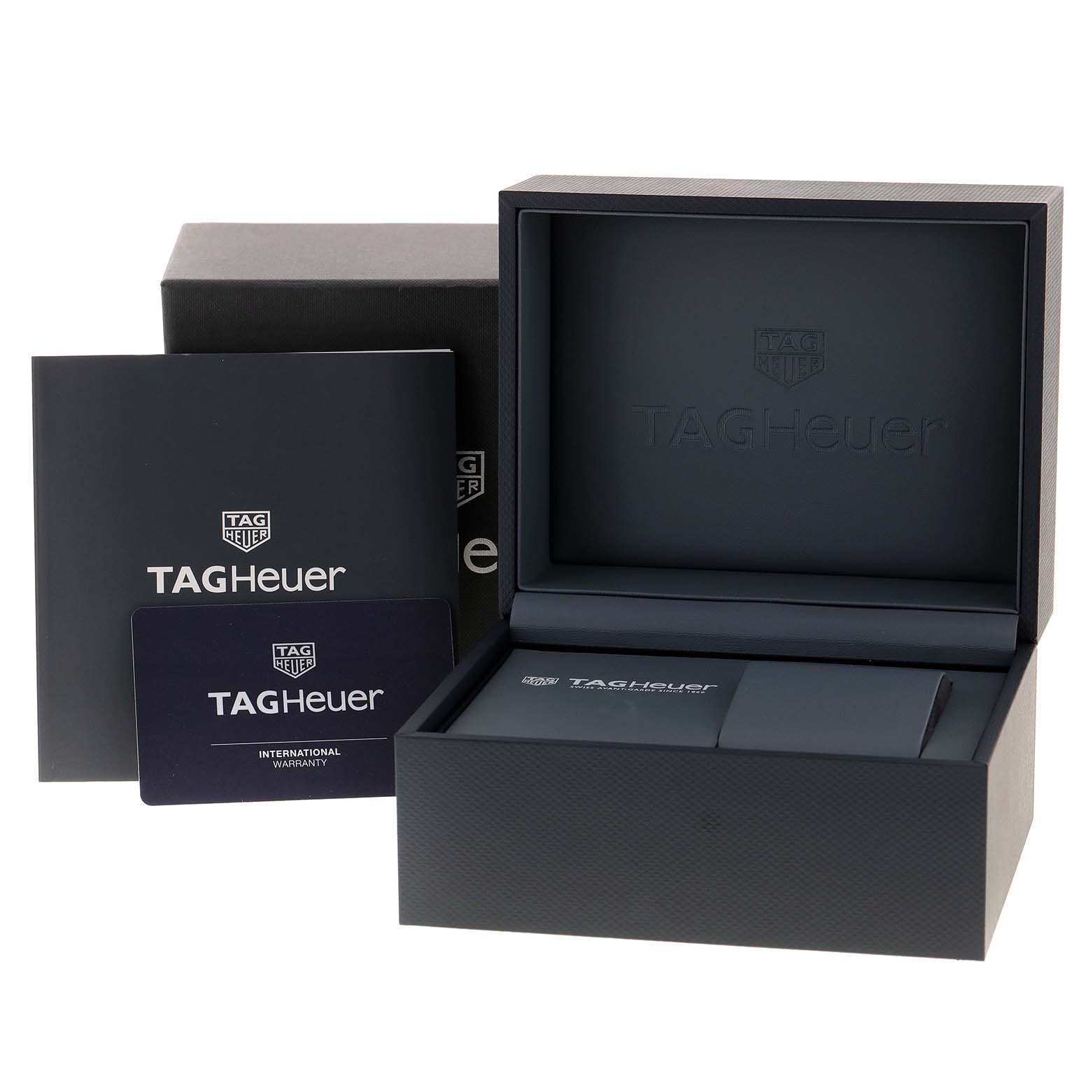 The image shows the box and packaging materials for the Carrera model by Tag Heuer.