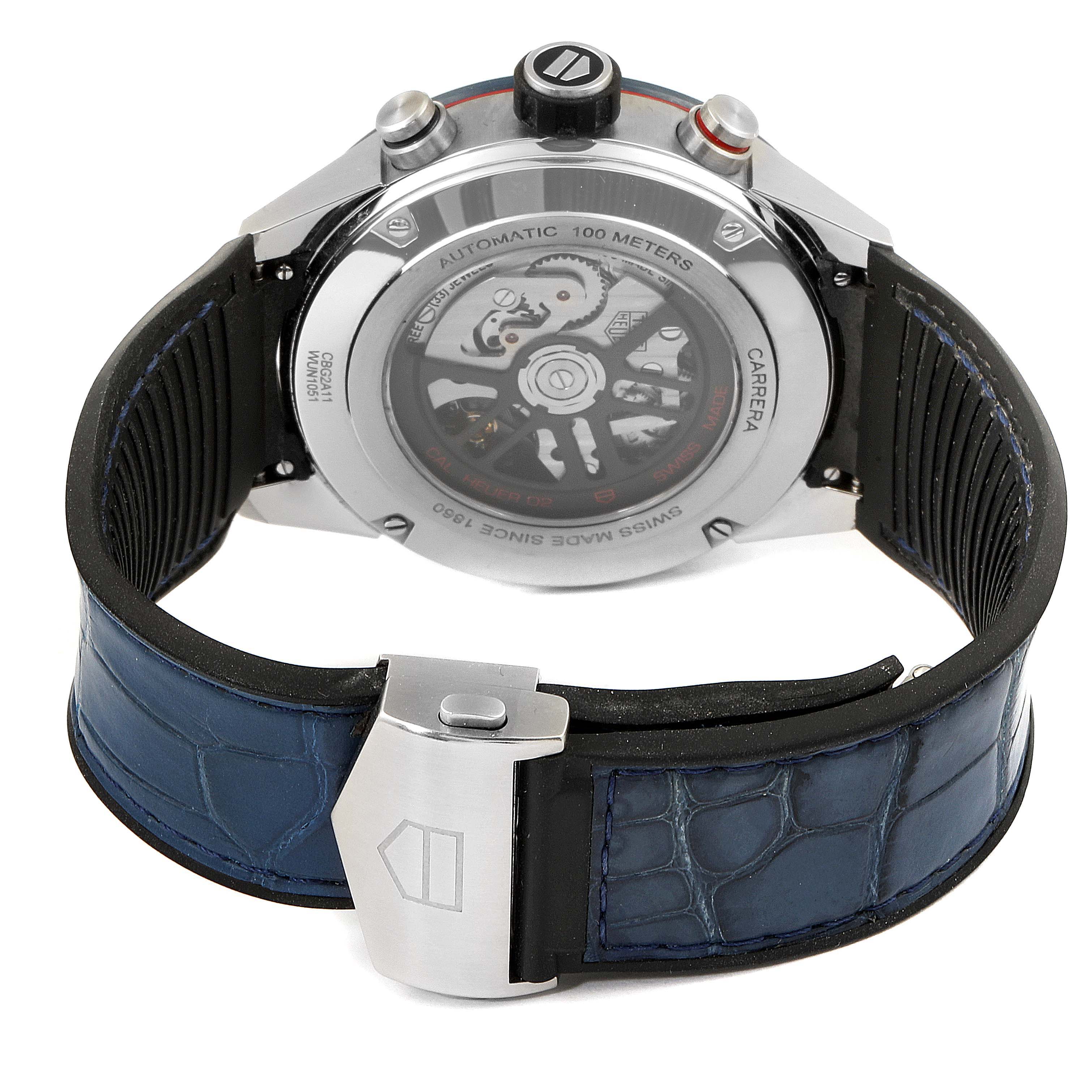 The image shows the backside of a Tag Heuer Carrera CBG2A11.FC6460 Men's Stainless Steel Blue Dial CBG2A11.FC6460 Men's Stainless Steel Blue Dial watch, highlighting its automatic movement and leather strap.