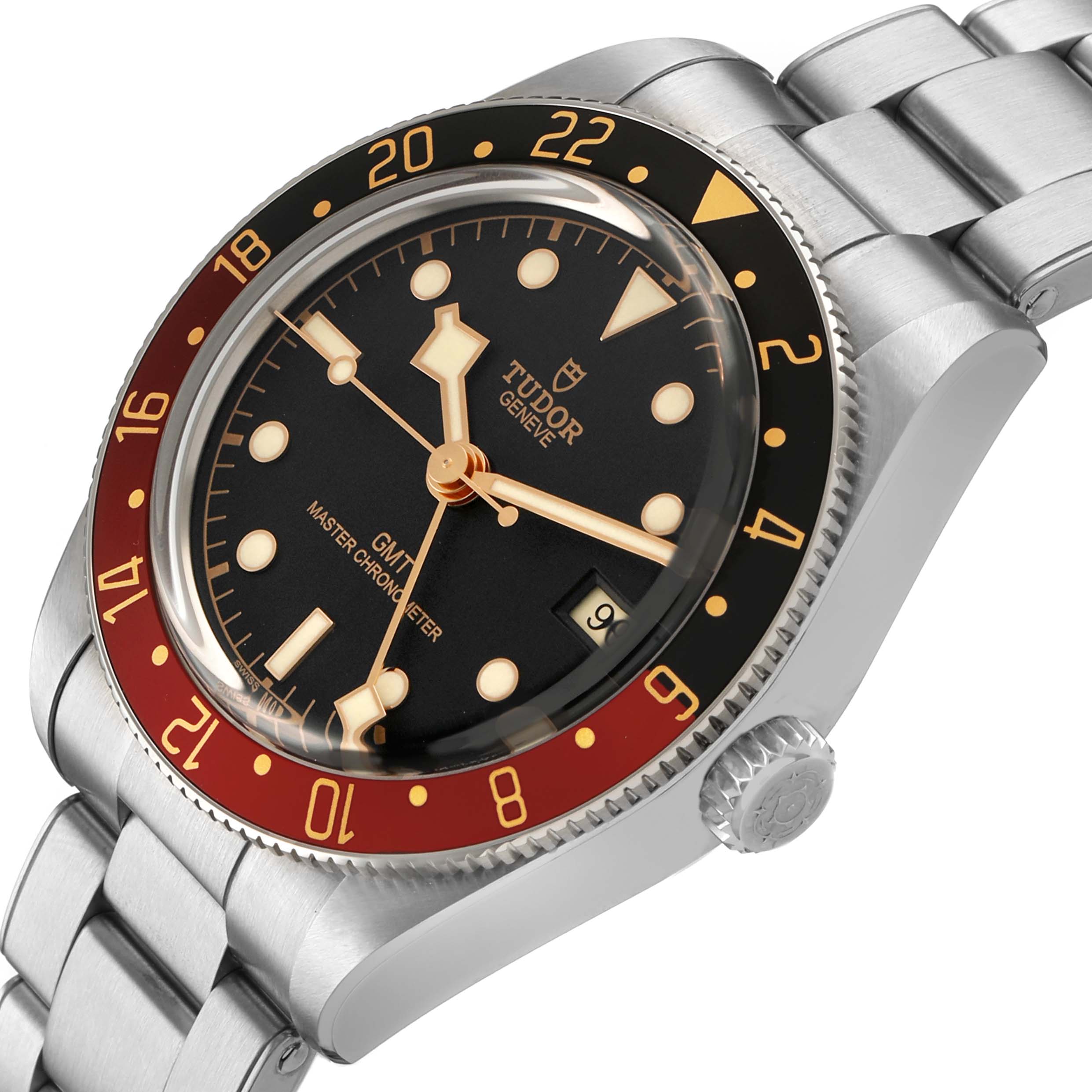 The Tudor Heritage Black Bay M7939G1A0NRU-0001 Men's Stainless Steel Black Dial watch is shown at a tilted angle, highlighting the bezel, dial, crown, and bracelet.