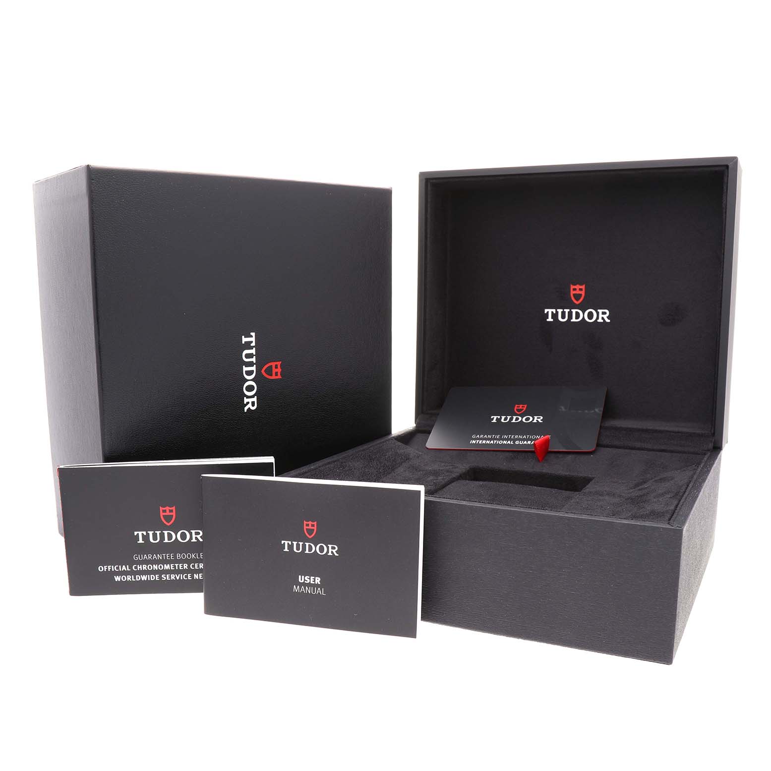 The image shows the open packaging for the Tudor Heritage Chrono 79360N Men's Stainless Steel Silver Dial, including the watch box, guarantee booklet, and user manual.