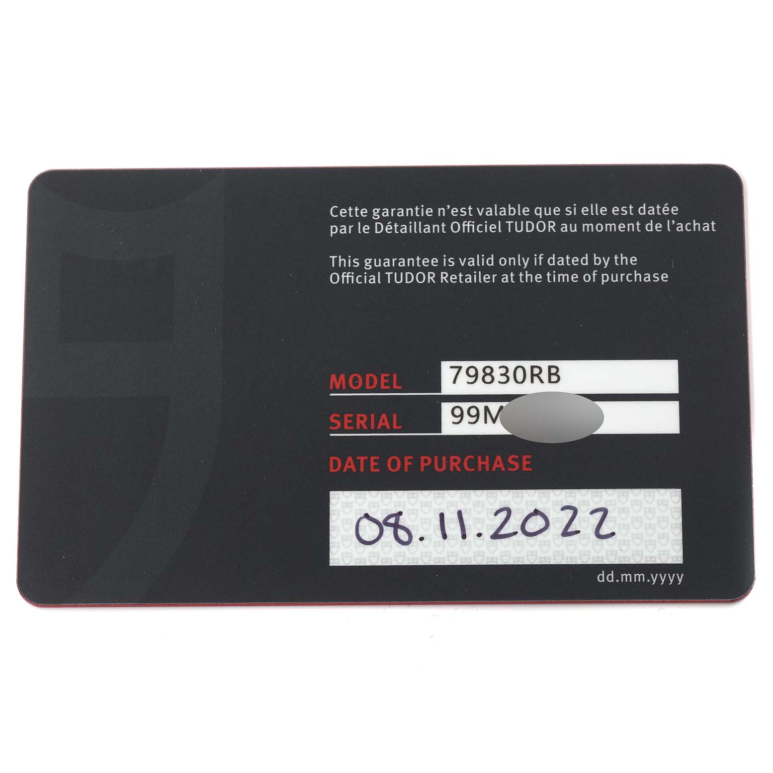 The image shows the warranty card for a Tudor Heritage Black Bay 79830RB Men's Stainless Steel Black Dial 79830RB Men's Stainless Steel Black Dial model watch, with purchase date and model information.