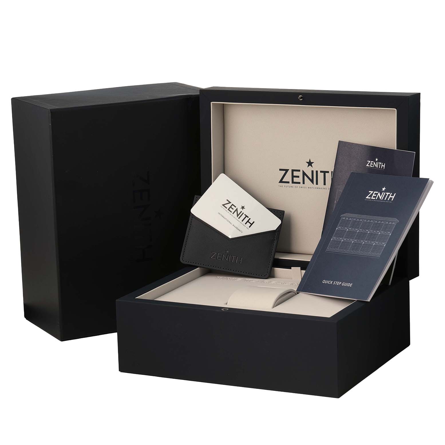 The image displays the open box of a Zenith Chronomaster 97.T384.4061/21.M384 Men's Titanium Black Dial, showing the exterior box, inner case, wallet, and booklets.