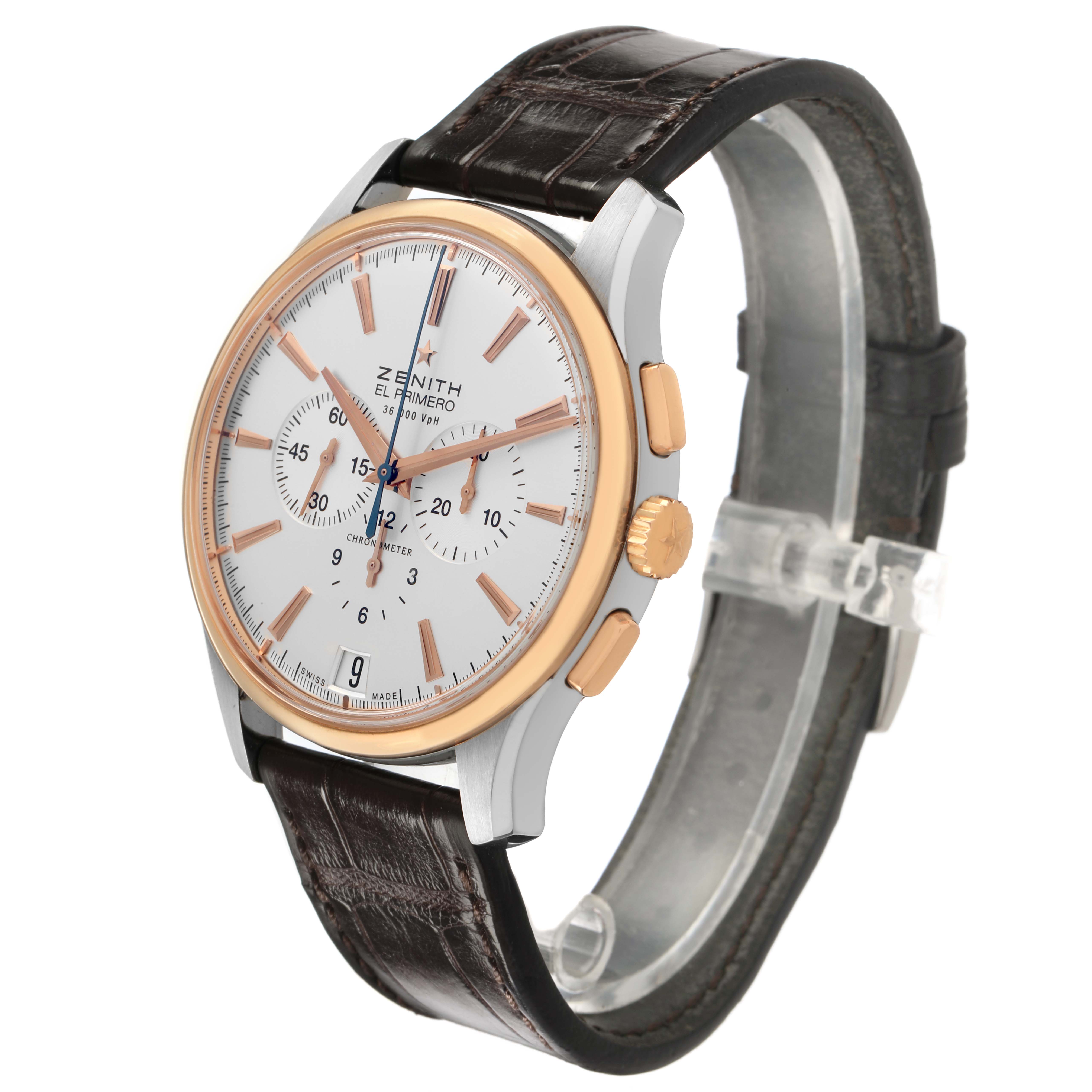 The Zenith El Primero 51.2112.400/01.C498 Men's Steel and Gold (two tone) Silver Dial watch is shown at a three-quarter angle, highlighting its face, bezel, crown, and leather strap.