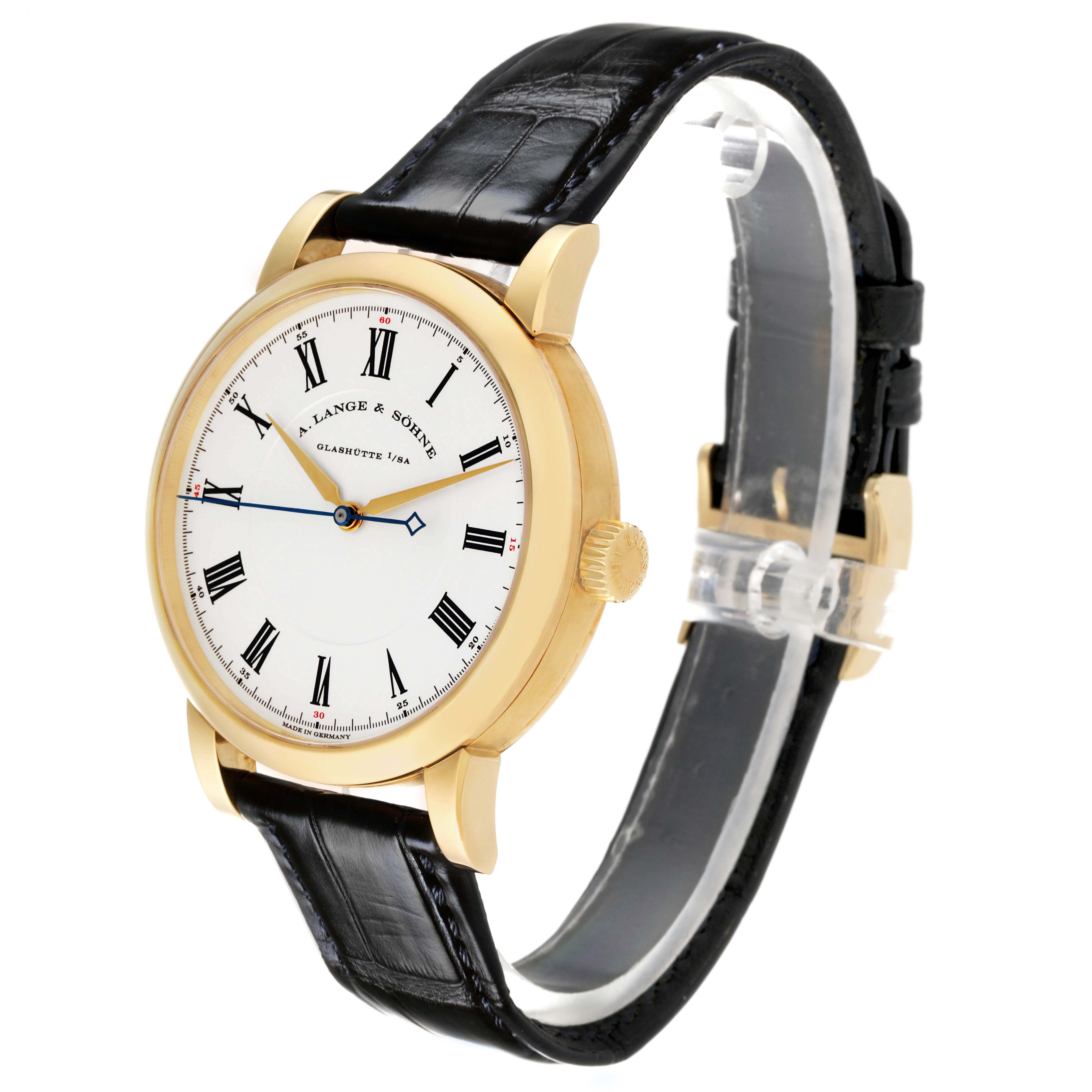 The Richard Lange by A. Lange & Söhne is shown at a three-quarter angle, highlighting the gold case, Roman numeral dial, black strap, and crown.