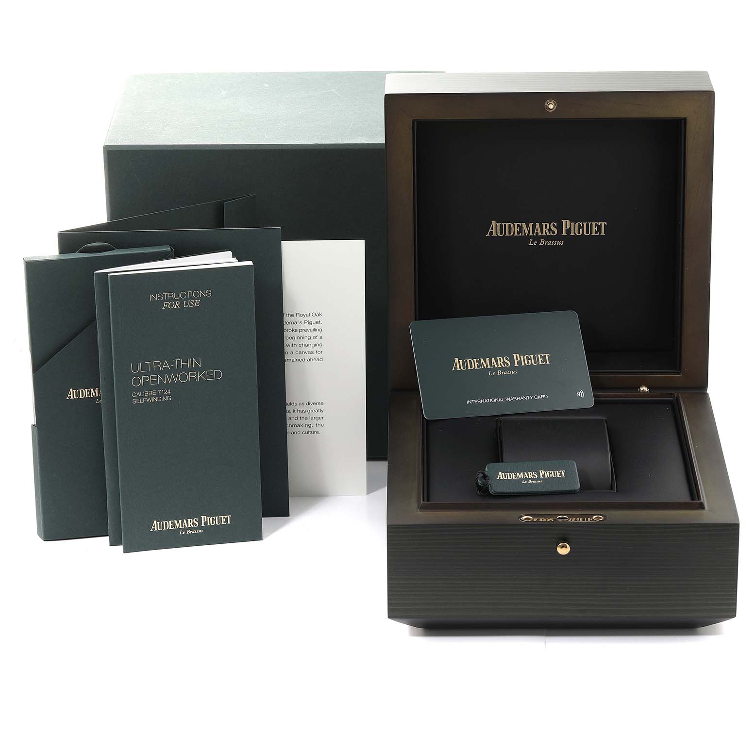 The image shows the packaging and accessories, including a warranty card and instruction booklets, for the Audemars Piguet Royal Oak 16204OR.OO.1240OR.01 Men's Rose Gold Grey Dial 16204OR.OO.1240OR.01 Men's Rose Gold Grey Dial watch.