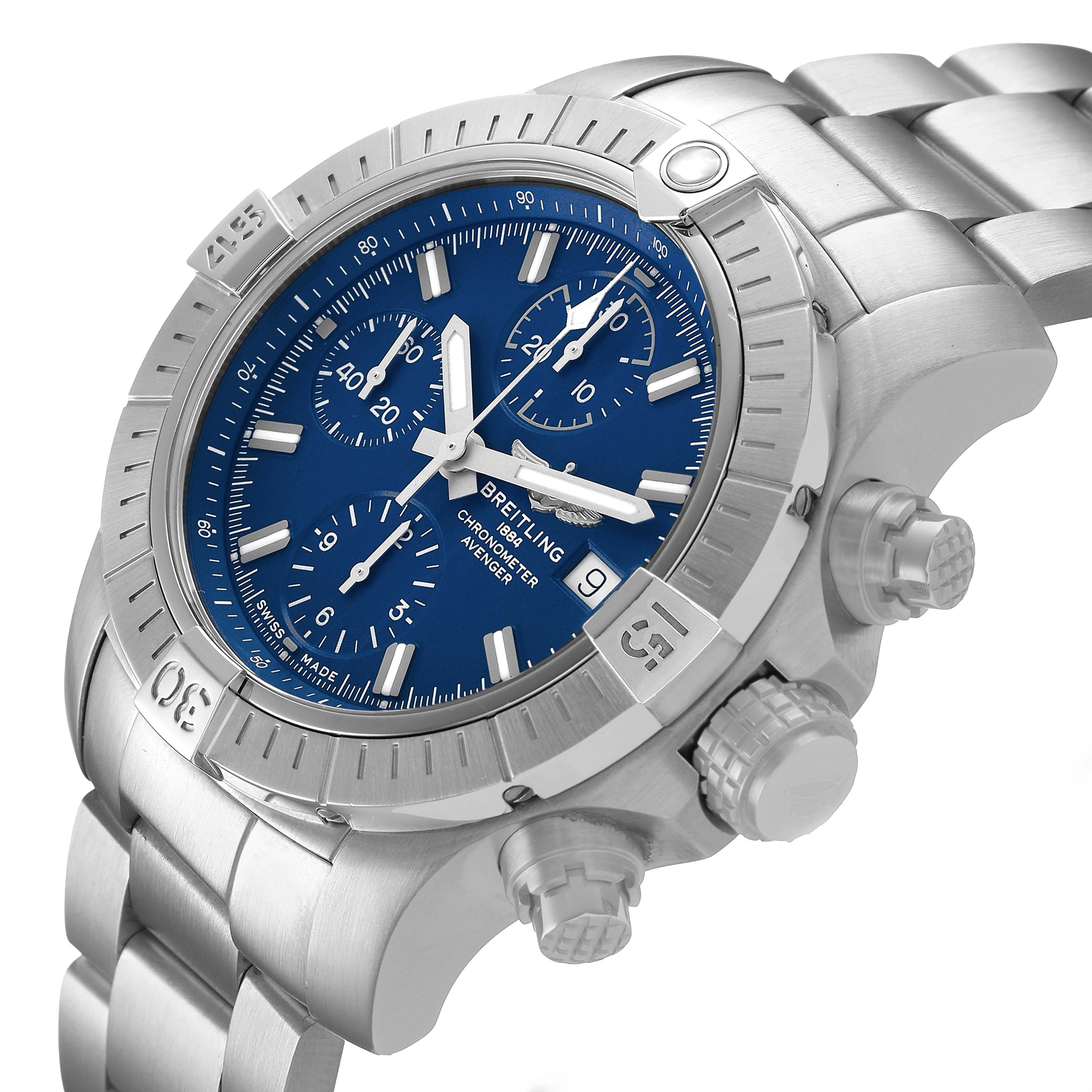 The Breitling Avenger A13385101C1A1 Men's Stainless Steel Blue Dial watch is shown at a three-quarter angle displaying the blue dial, bezel, chronograph dials, and metal bracelet.