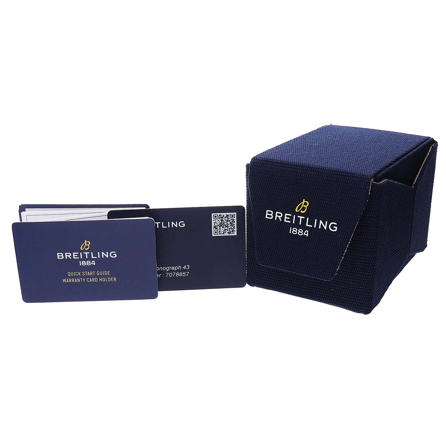 The image shows the packaging, warranty card holder, and manuals for a Breitling Avenger A13385101C1A1 Men's Stainless Steel Blue Dial watch.