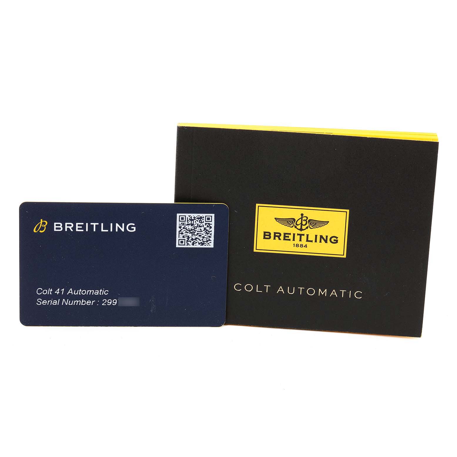 The image shows a Breitling Colt A1731310/F584/190A Men's Stainless Steel Grey Dial A1731310/F584/190A Men's Stainless Steel Grey Dial model warranty card and an accompanying booklet placed at an angle.
