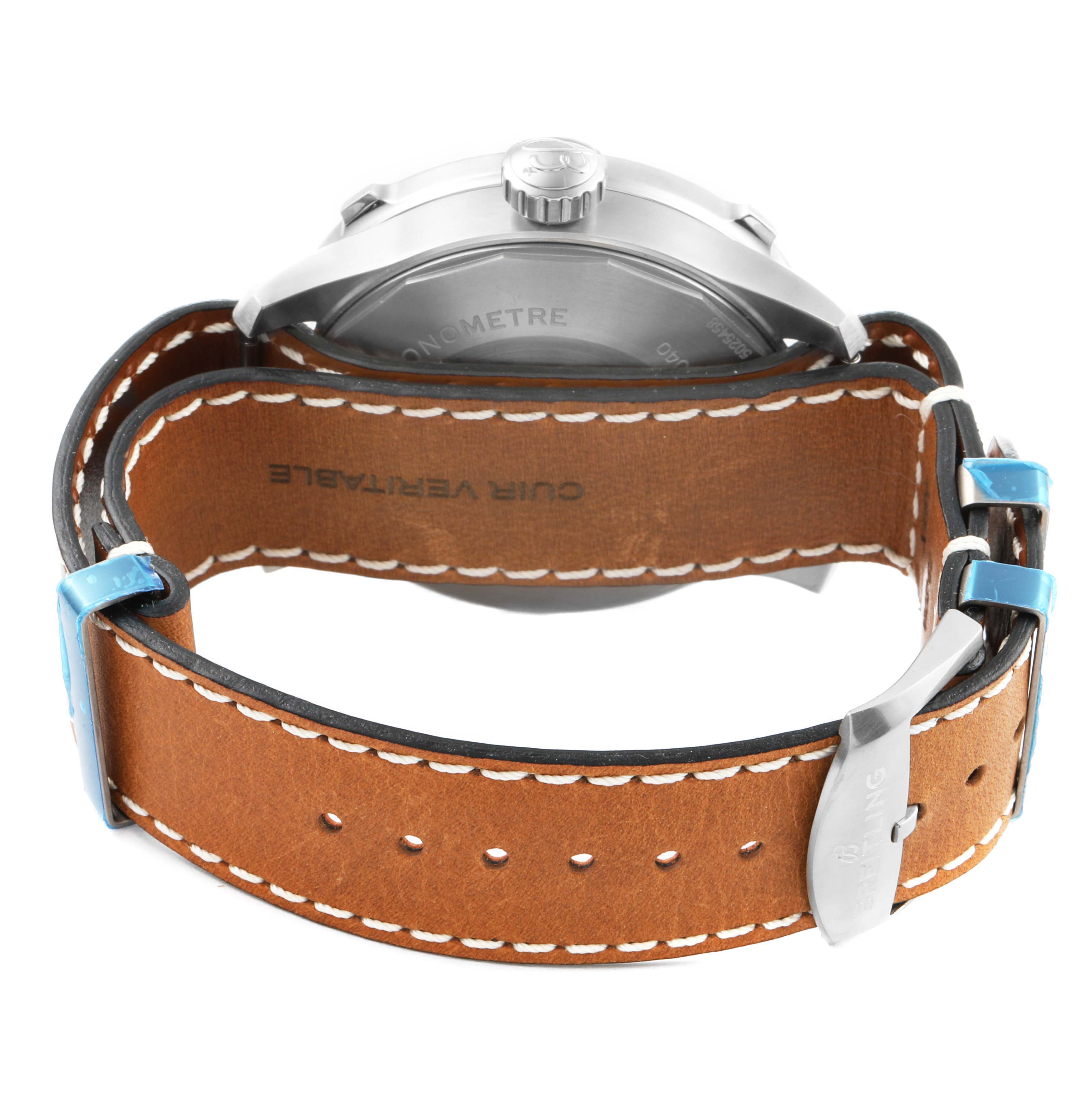 This image shows the back and side of a Breitling Navitimer watch with a brown leather strap and a metal clasp.