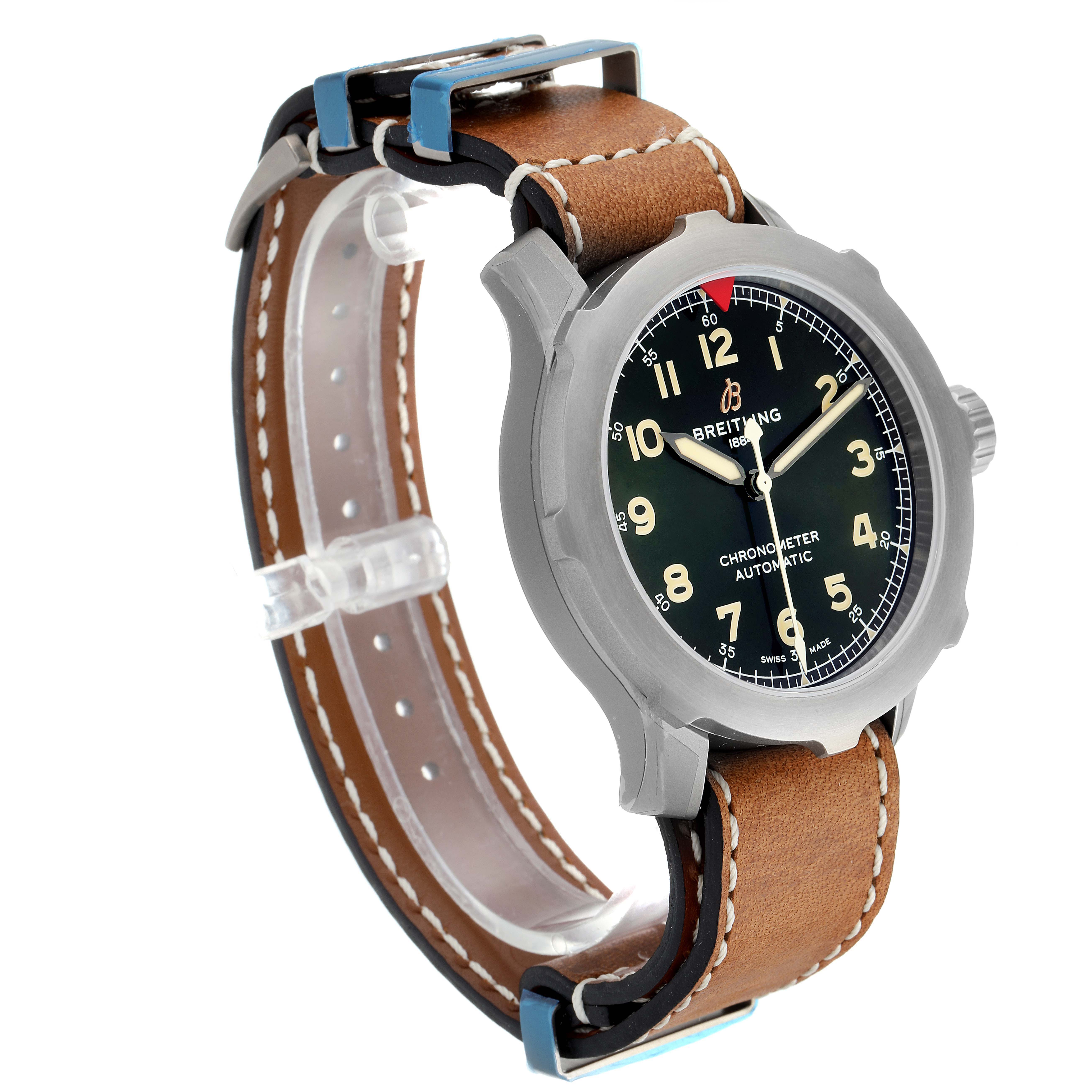 The Breitling Navitimer watch is shown at a 3/4 angle, highlighting its face, case, and leather strap with stitching details.