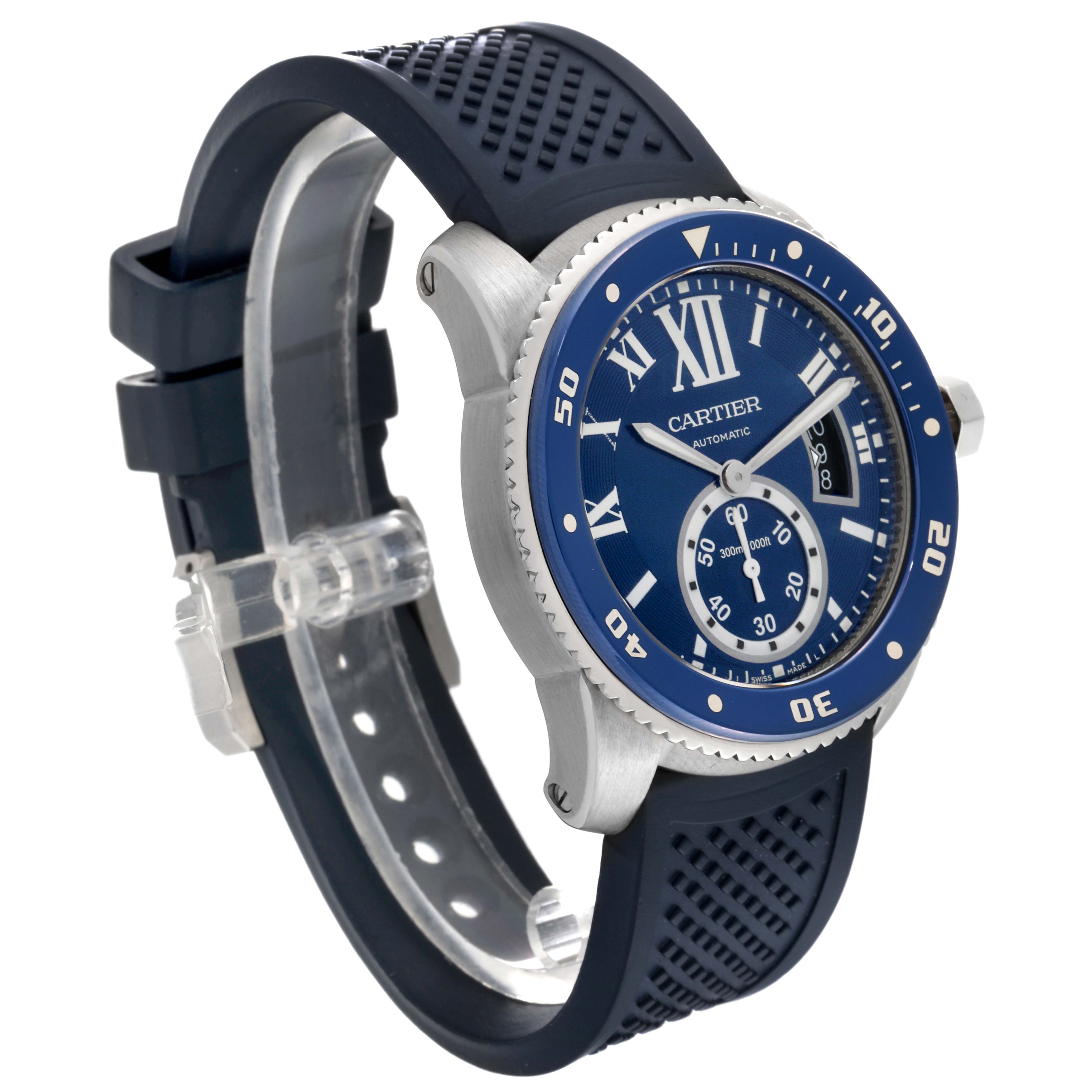 The image shows a side and front angle of a Calibre de Cartier watch by Cartier, featuring a blue dial and rubber strap.