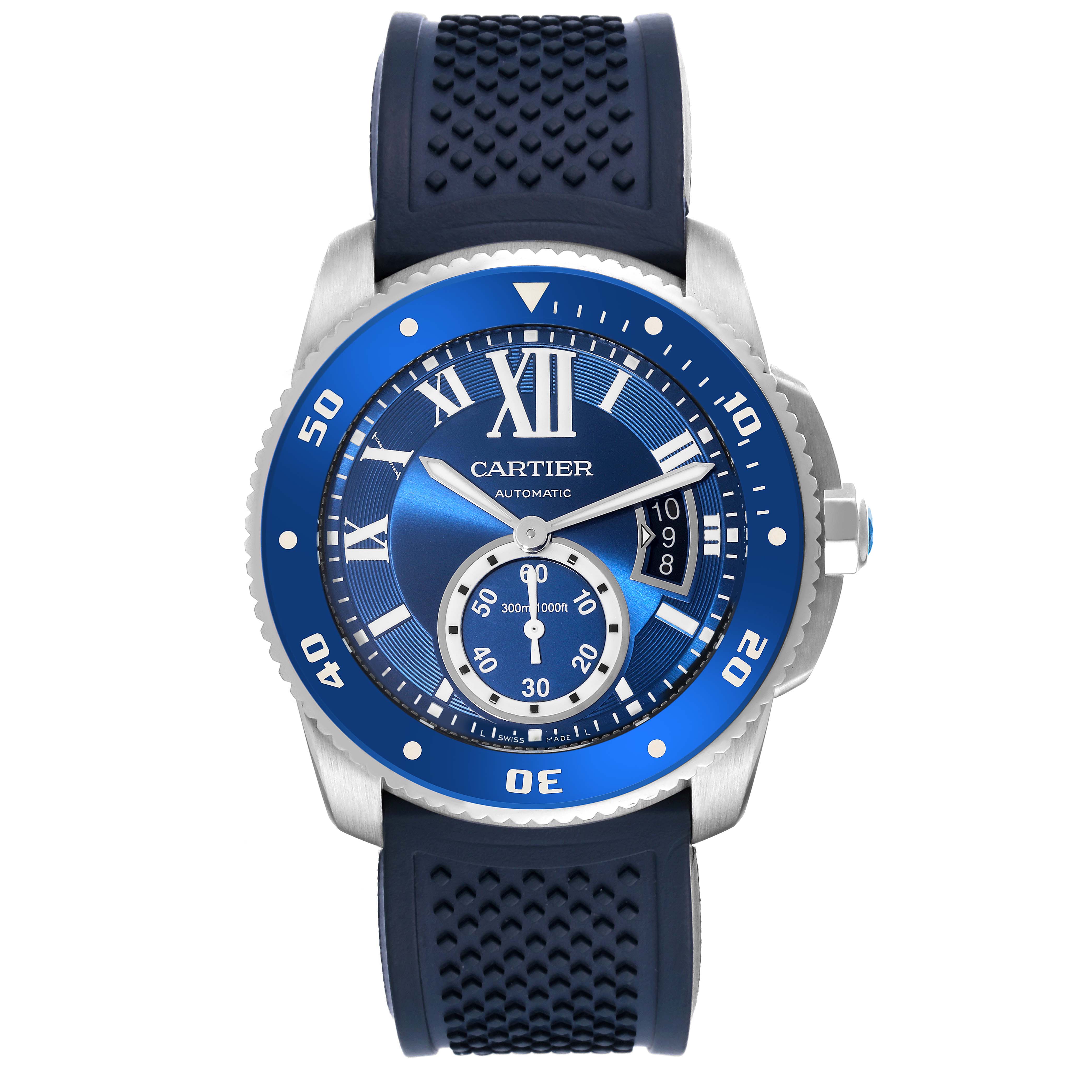 This image shows a front view of the Calibre de Cartier watch by Cartier, highlighting its blue dial, bezel, and rubber strap.