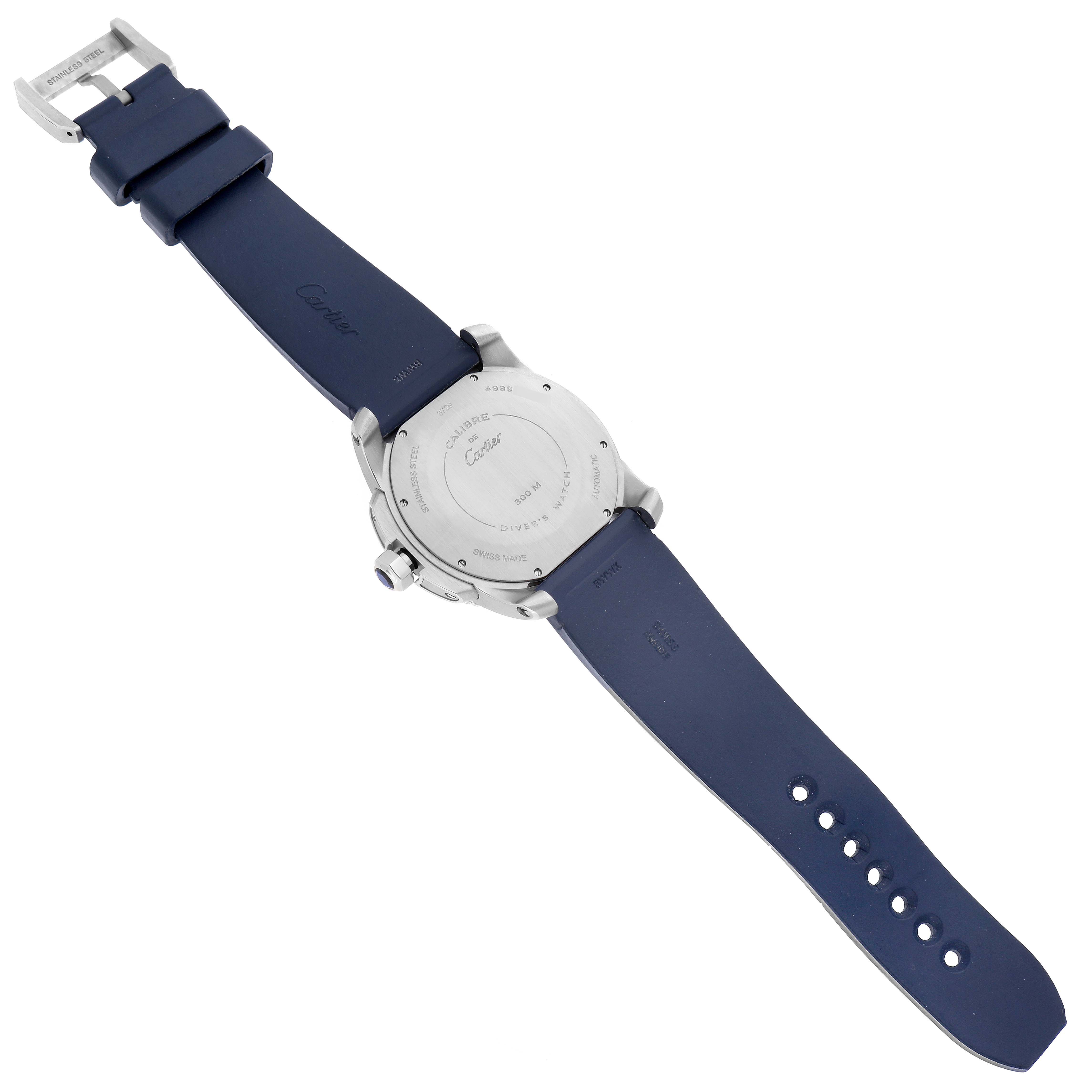 The image shows the rear view of a Calibre de Cartier watch by Cartier, highlighting the case back, strap, and buckle.