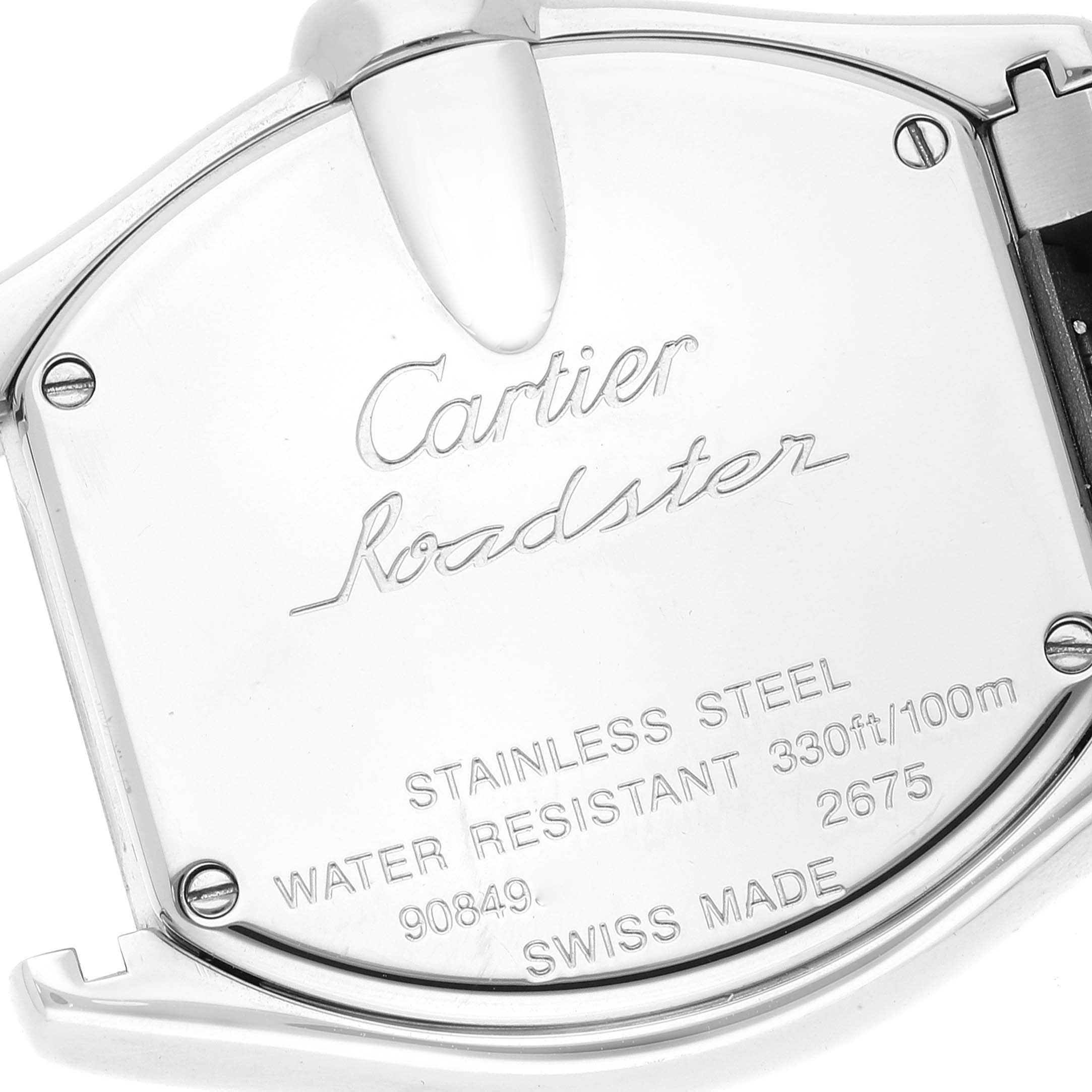 The image shows the back casing of a Cartier Roadster W6206006 Women's Stainless Steel Mother of Pearl Dial W6206006 Women's Stainless Steel Mother of Pearl Dial watch, highlighting engravings and screws.