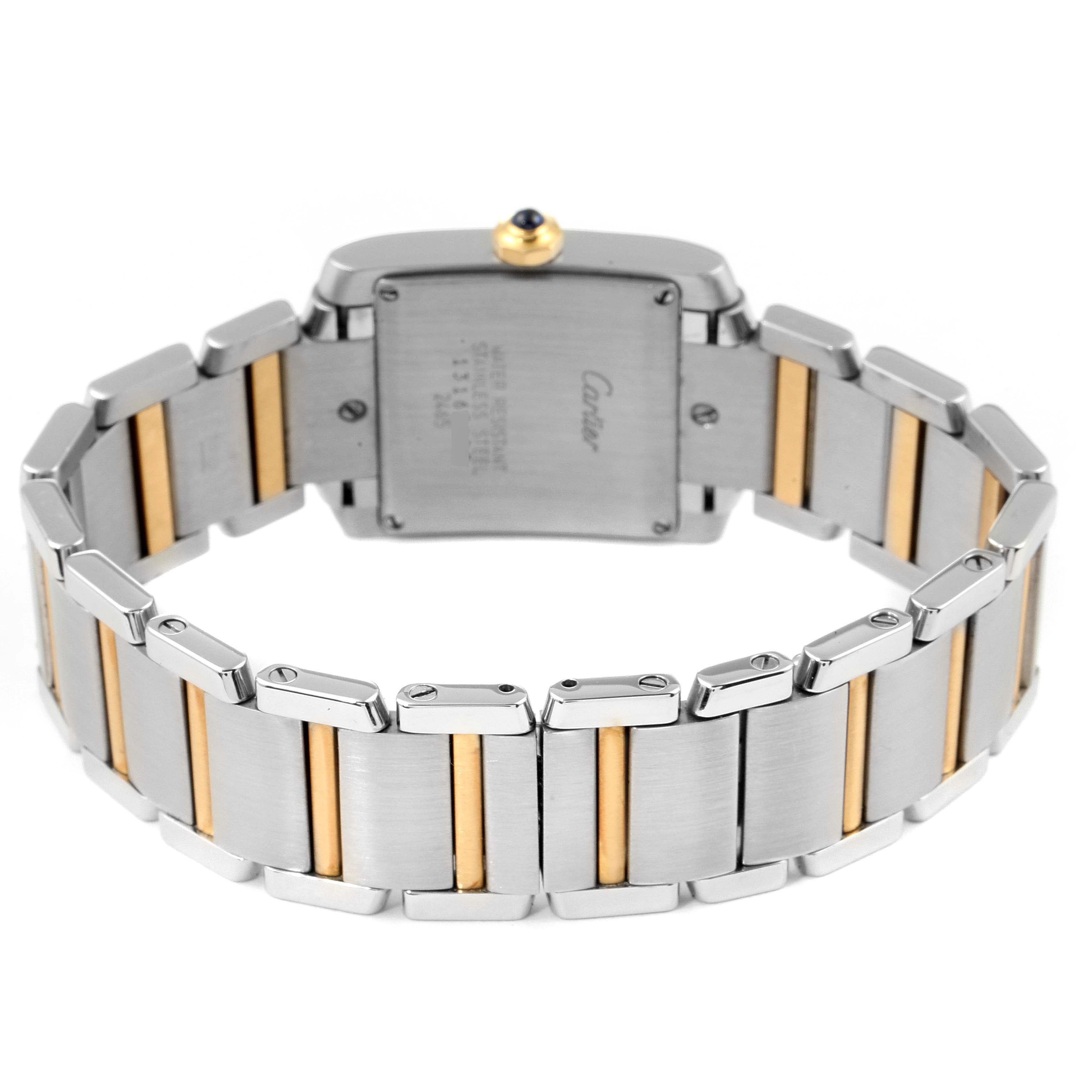 The image shows the back view of the Cartier Tank Francaise W51012Q4 Women's Steel and Gold (two tone) Silver Dial W51012Q4 Women's Steel and Gold (two tone) Silver Dial watch, highlighting its two-tone metal bracelet and case back.