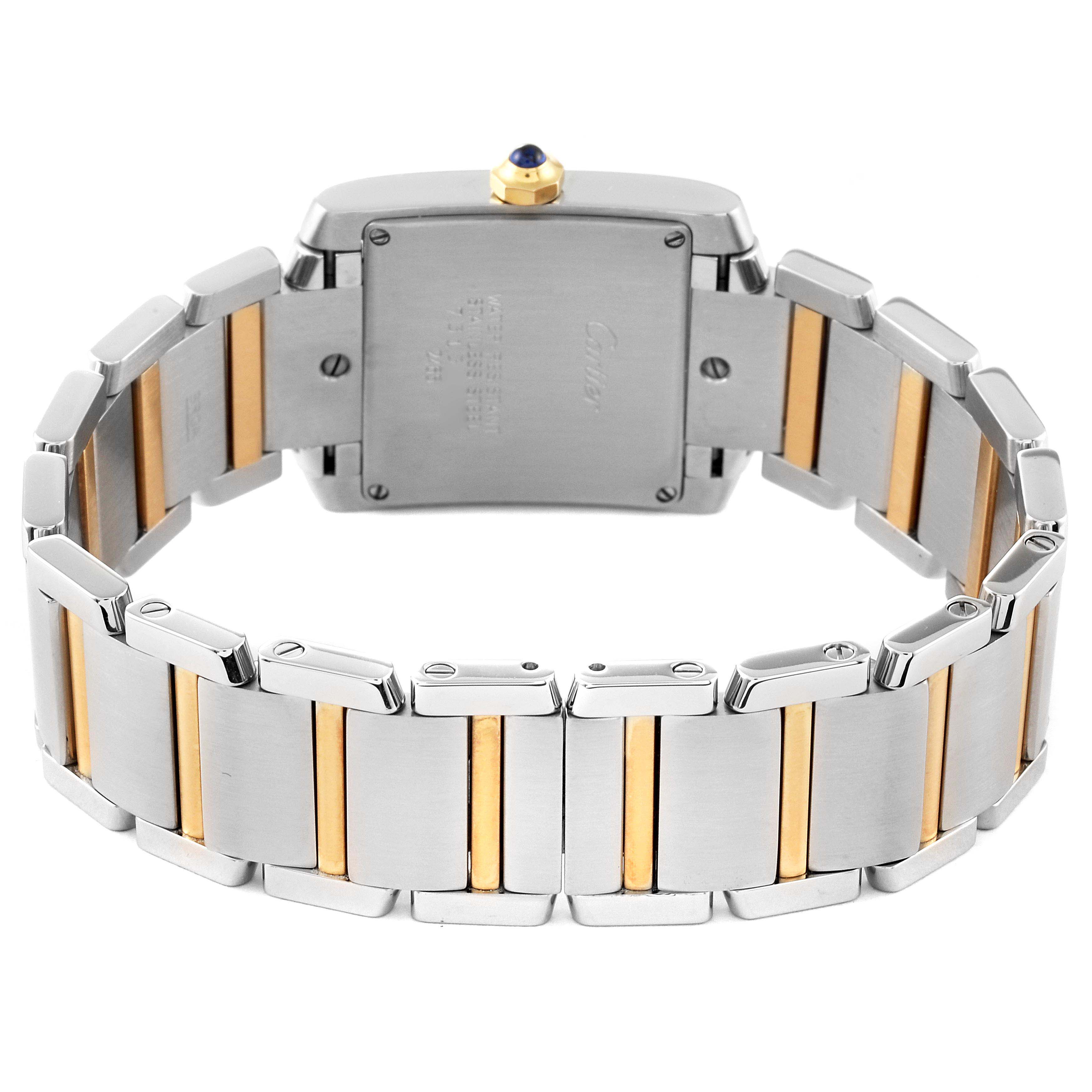 The image shows the back and bracelet of the Cartier Tank Francaise W51012Q4 Women's Steel and Gold (two tone) Silver Dial W51012Q4 Women's Steel and Gold (two tone) Silver Dial watch, highlighting its stainless steel and gold design.