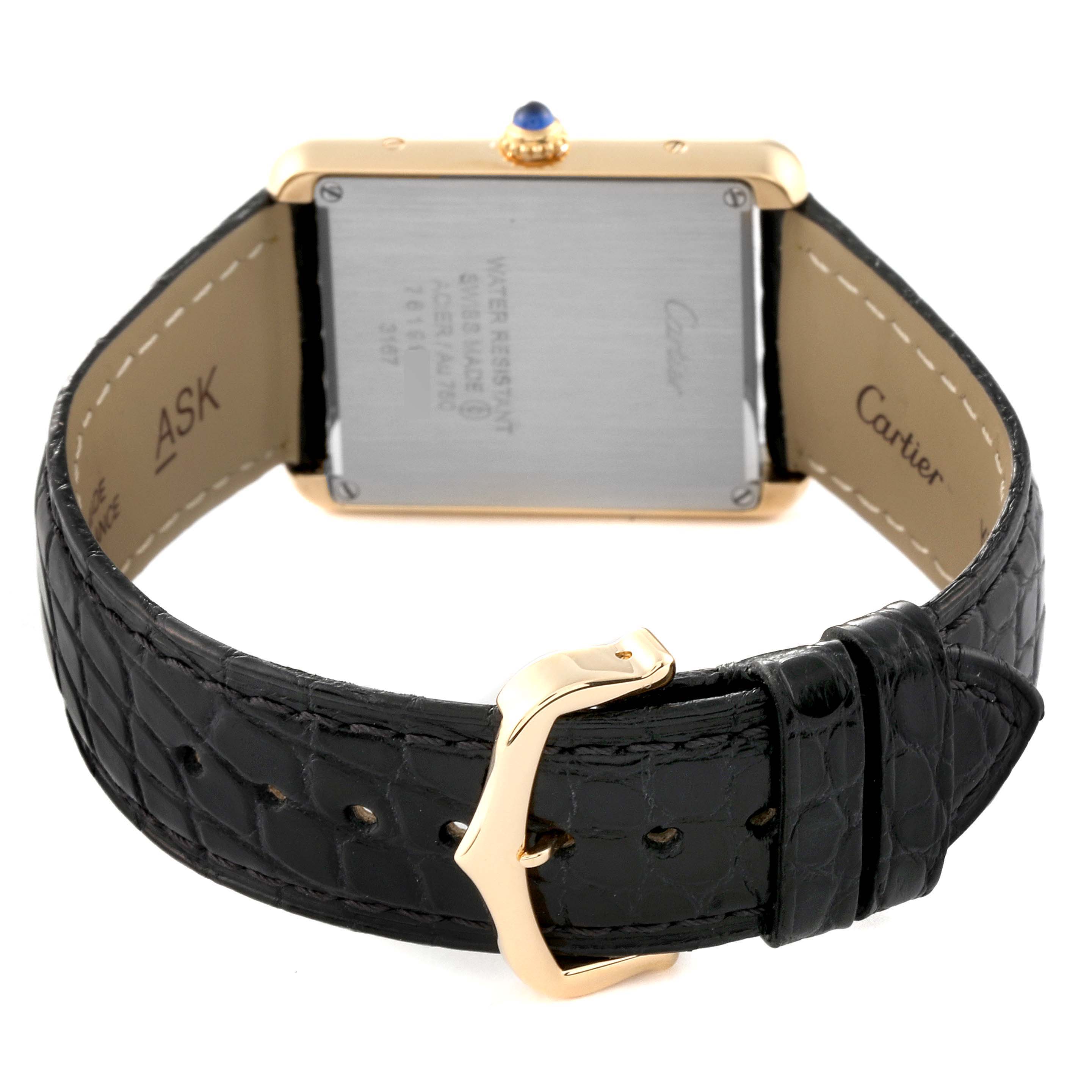 The Cartier Tank Solo W5200004 Men
s Steel and Gold (two tone) Silver Dial W5200004 Men
s Steel and Gold (two tone) Silver Dial watch is shown from the back, displaying its strap, buckle, and case back.