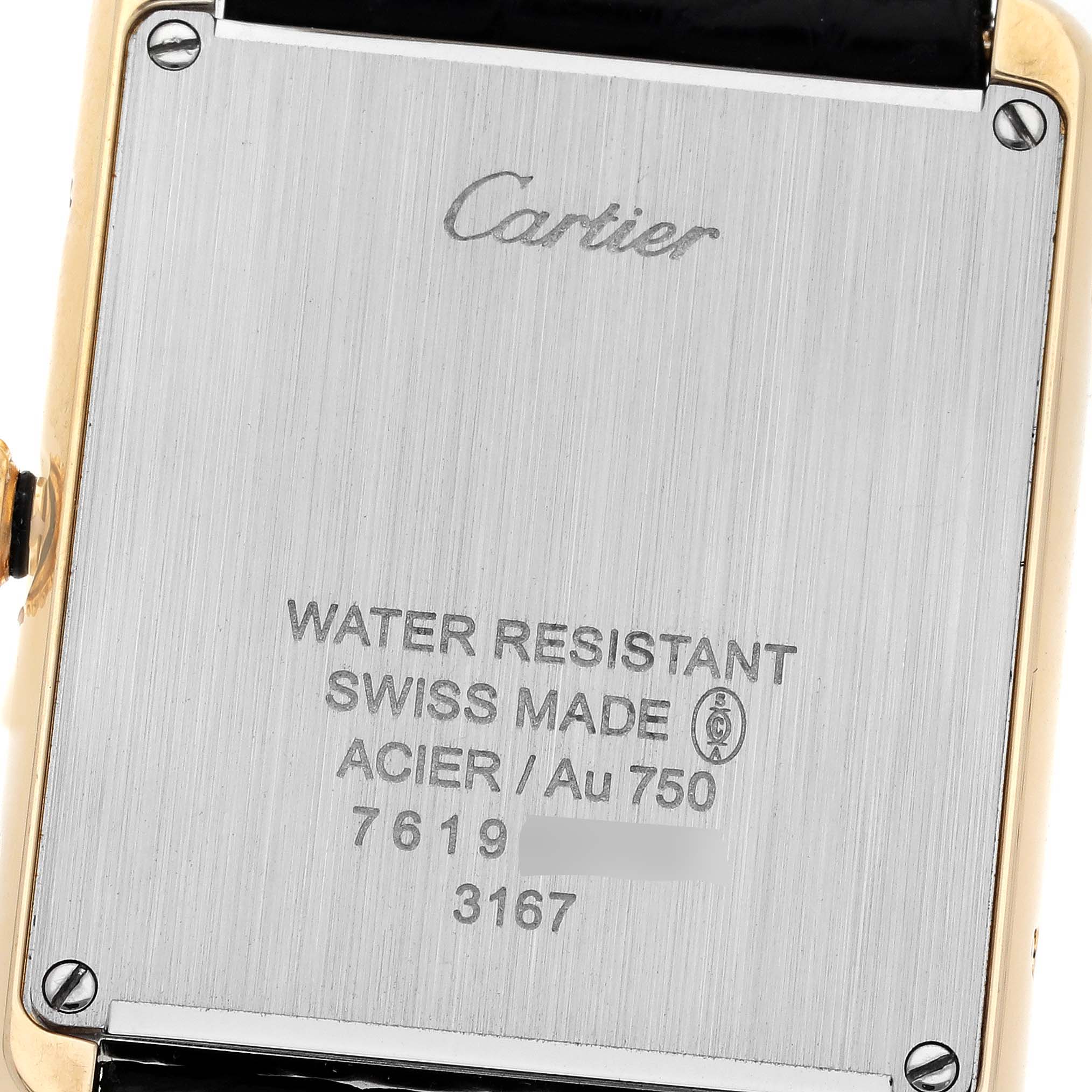 This is the back of the Cartier Tank Solo W5200004 Men
s Steel and Gold (two tone) Silver Dial W5200004 Men
s Steel and Gold (two tone) Silver Dial watch, showing the engraved brand, model details, and screws.