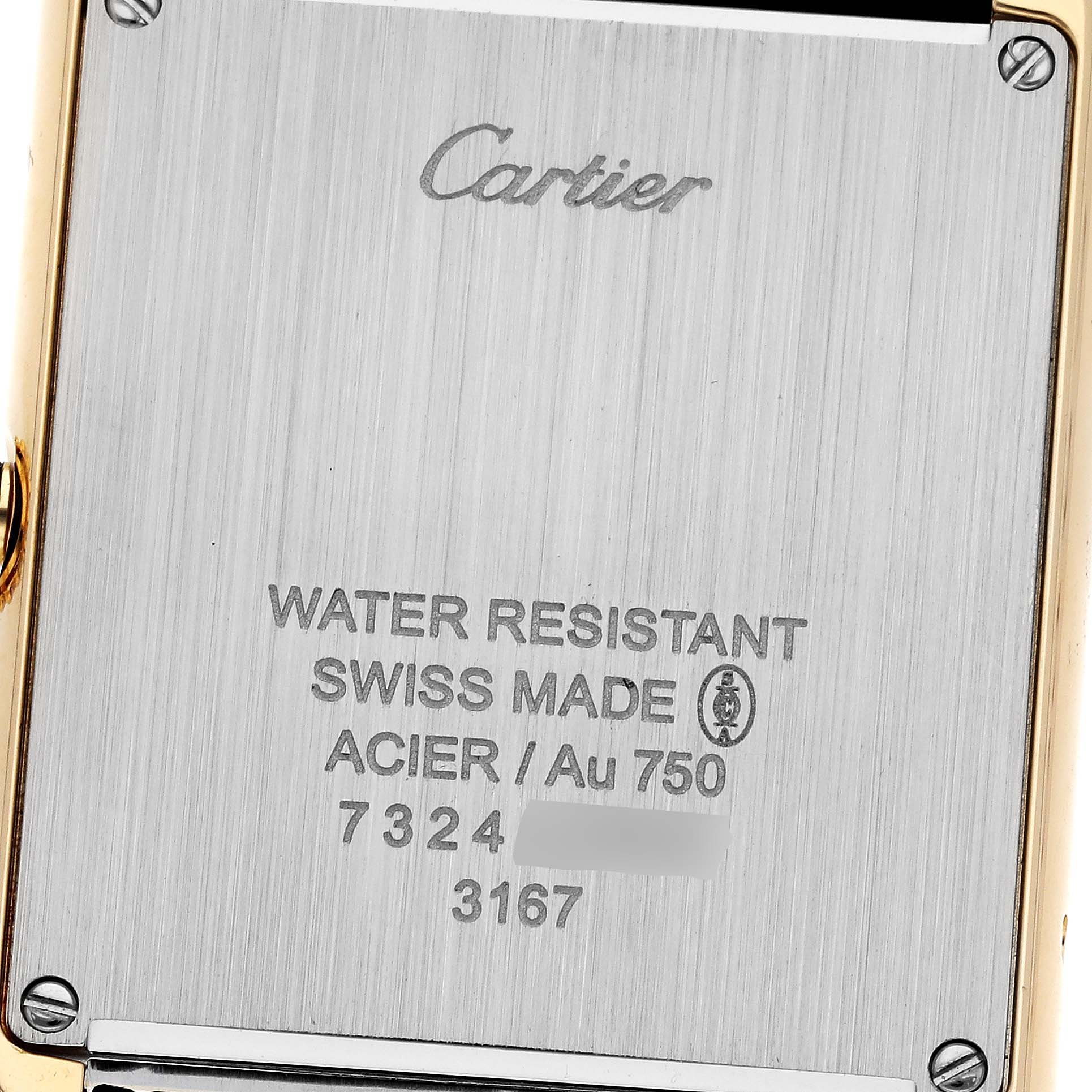 This image shows the back case of a Cartier Tank Solo W5200004 Men's Steel and Gold (two tone) Silver Dial W5200004 Men's Steel and Gold (two tone) Silver Dial watch with engraving details.