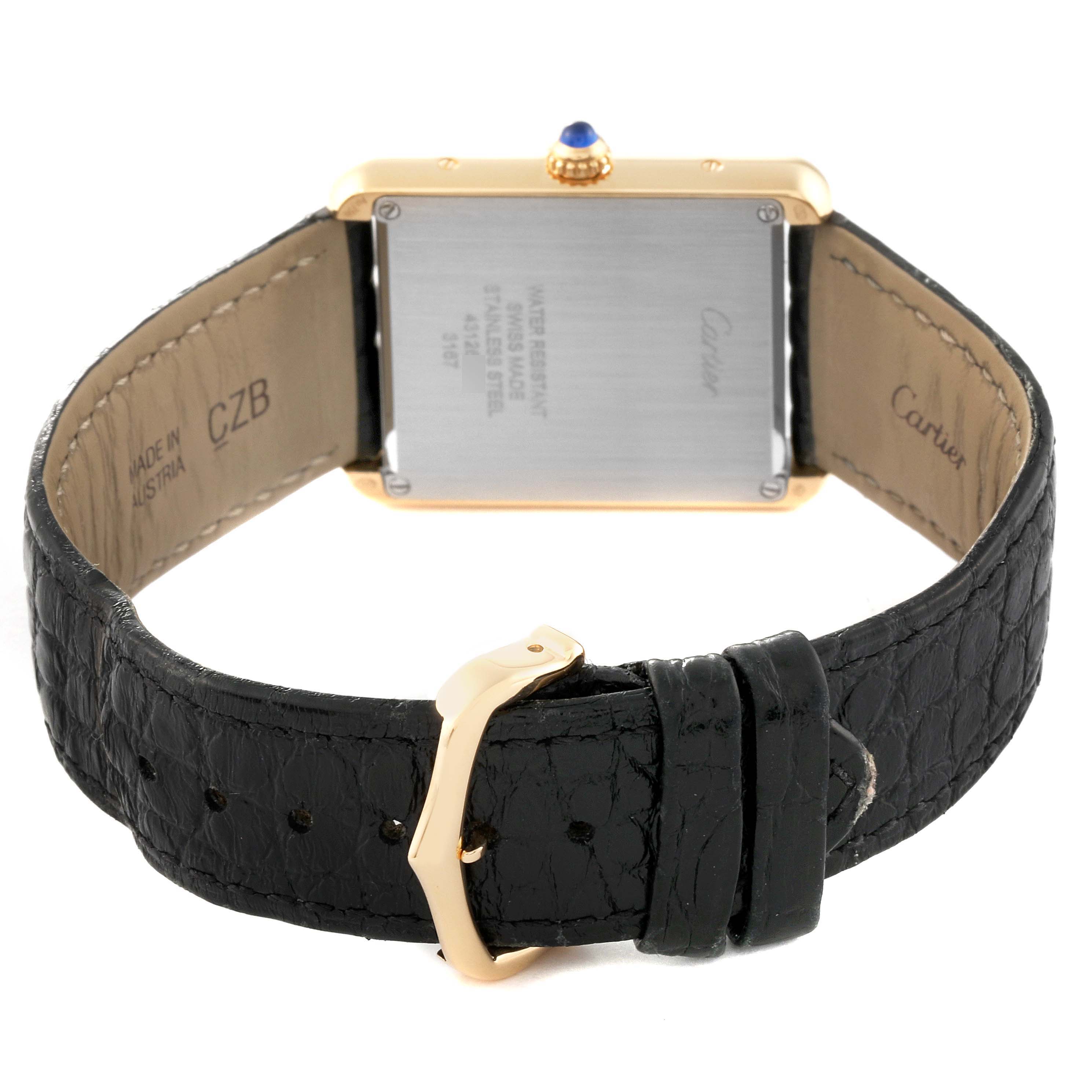 The image shows the back view of a Cartier Tank Solo W5200004 Men's Steel and Gold (two tone) Silver Dial W5200004 Men's Steel and Gold (two tone) Silver Dial watch, highlighting the case back, strap, and buckle.