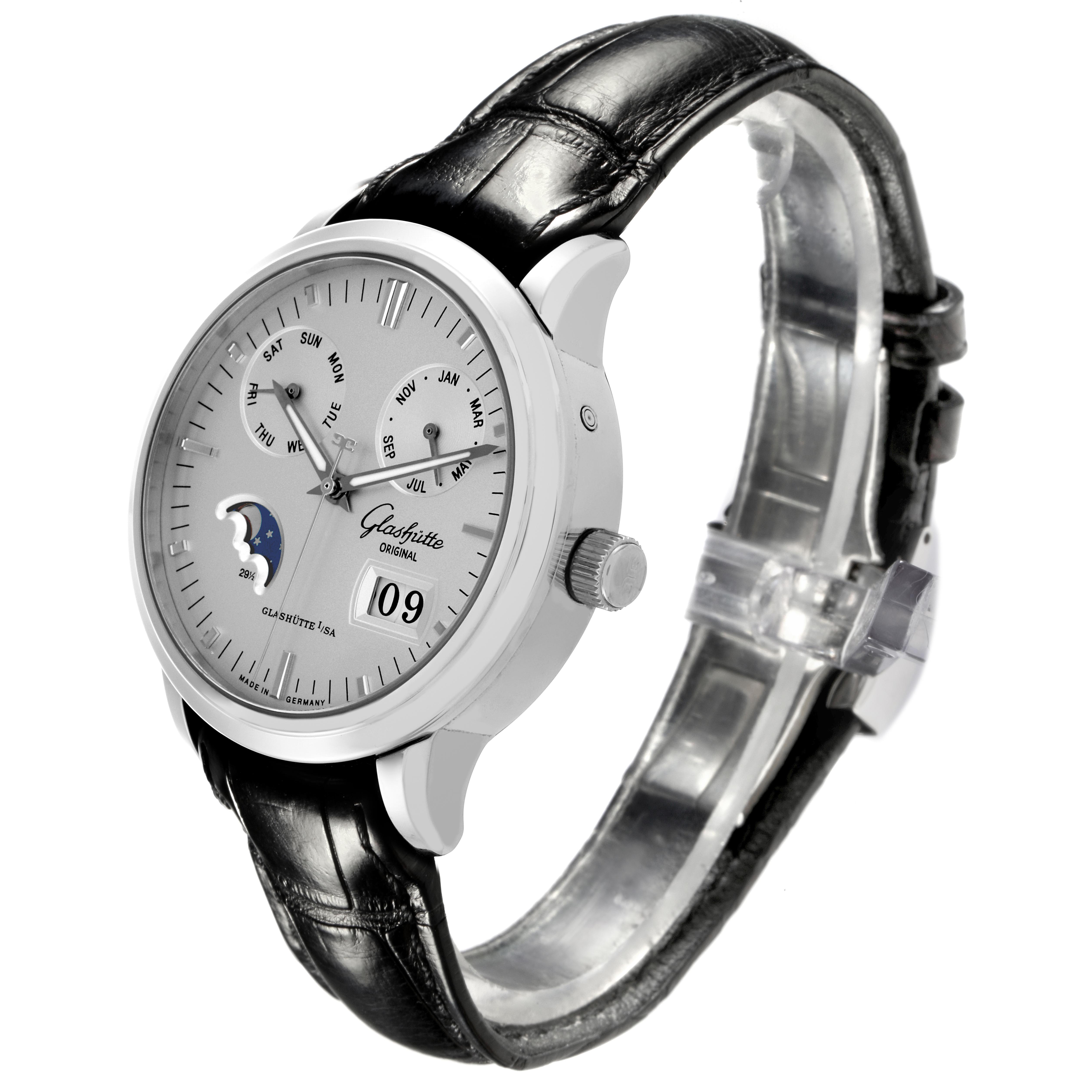 The Glashütte Senator watch is shown at a three-quarter angle, highlighting the dial, crown, and black leather strap.