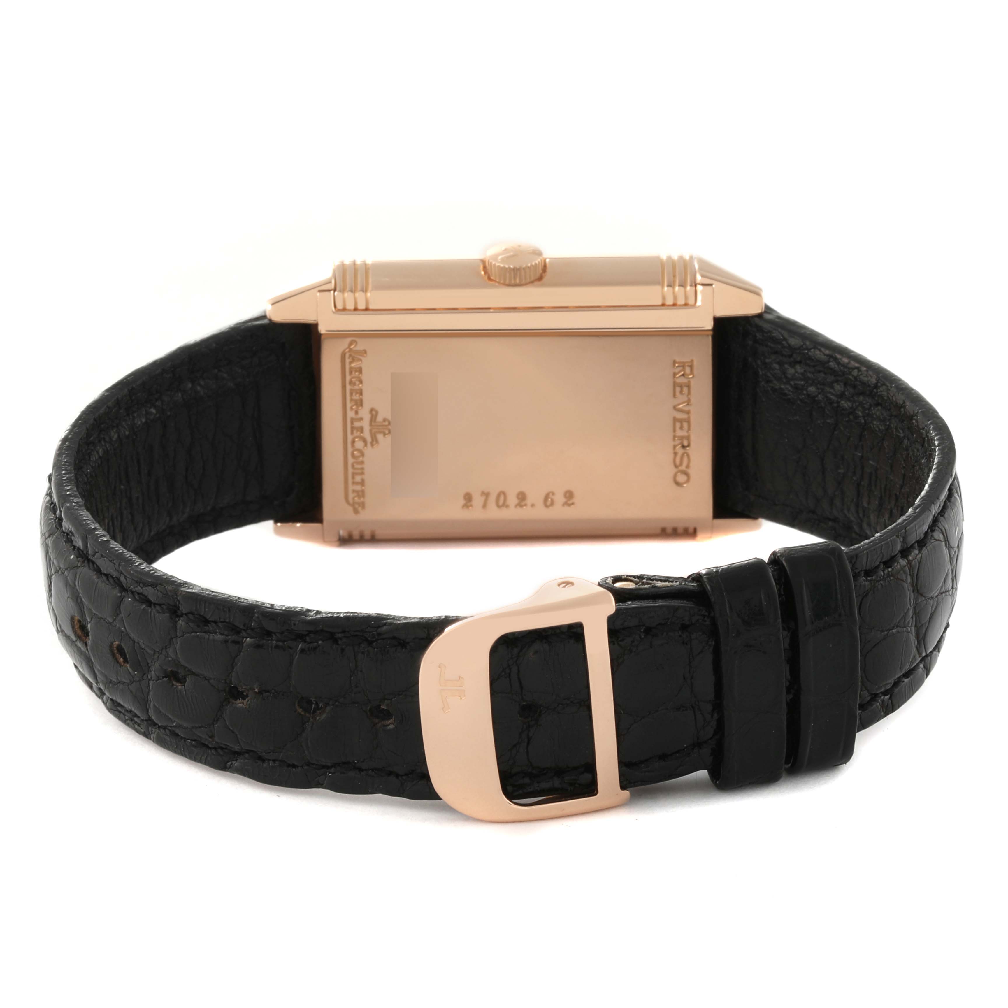 The image shows the back view of the Jaeger LeCoultre Reverso 270.2.62 Men's Rose Gold Silver Dial 270.2.62 Men's Rose Gold Silver Dial watch with its black leather strap and buckle.
