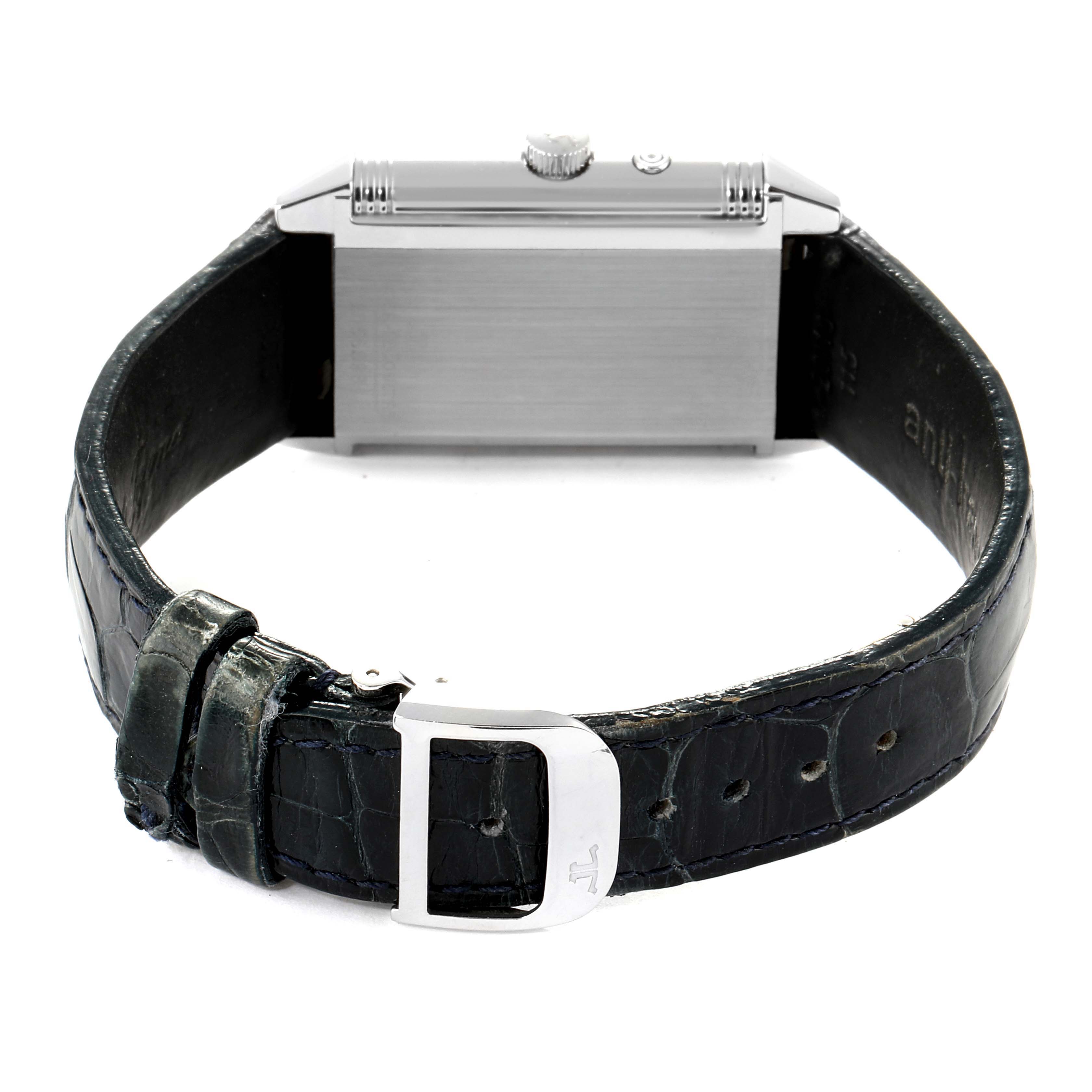 This image shows the Jaeger LeCoultre Reverso Q270854 Men's Stainless Steel Silver Dial Q270854 Men's Stainless Steel Silver Dial watch from a rear angle, highlighting its clasp and leather strap.