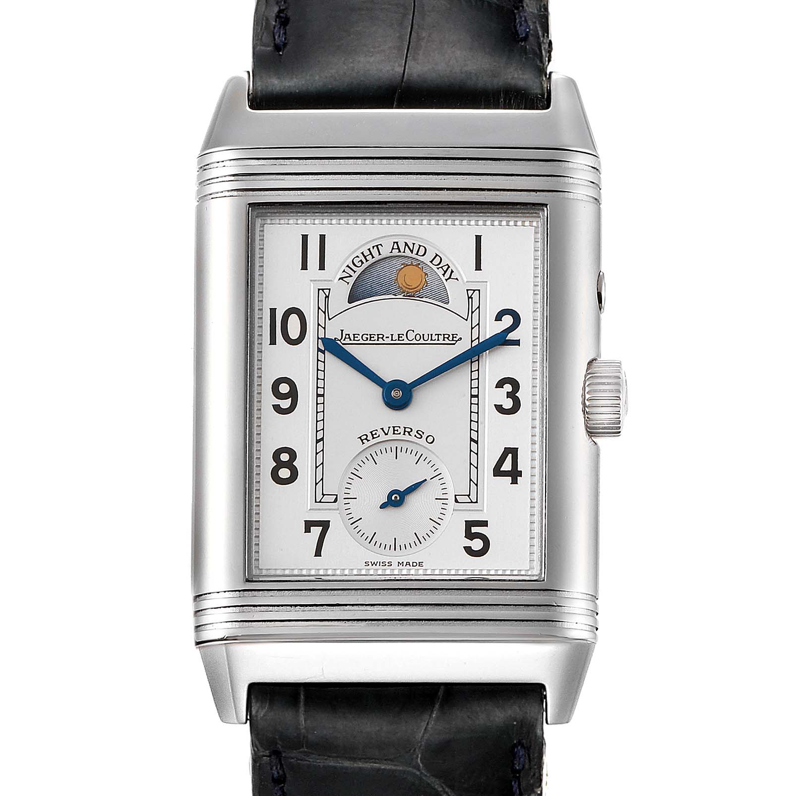 The image shows a front view of a Jaeger-LeCoultre Reverso watch, featuring the night and day indicator, blue hands, and leather strap.