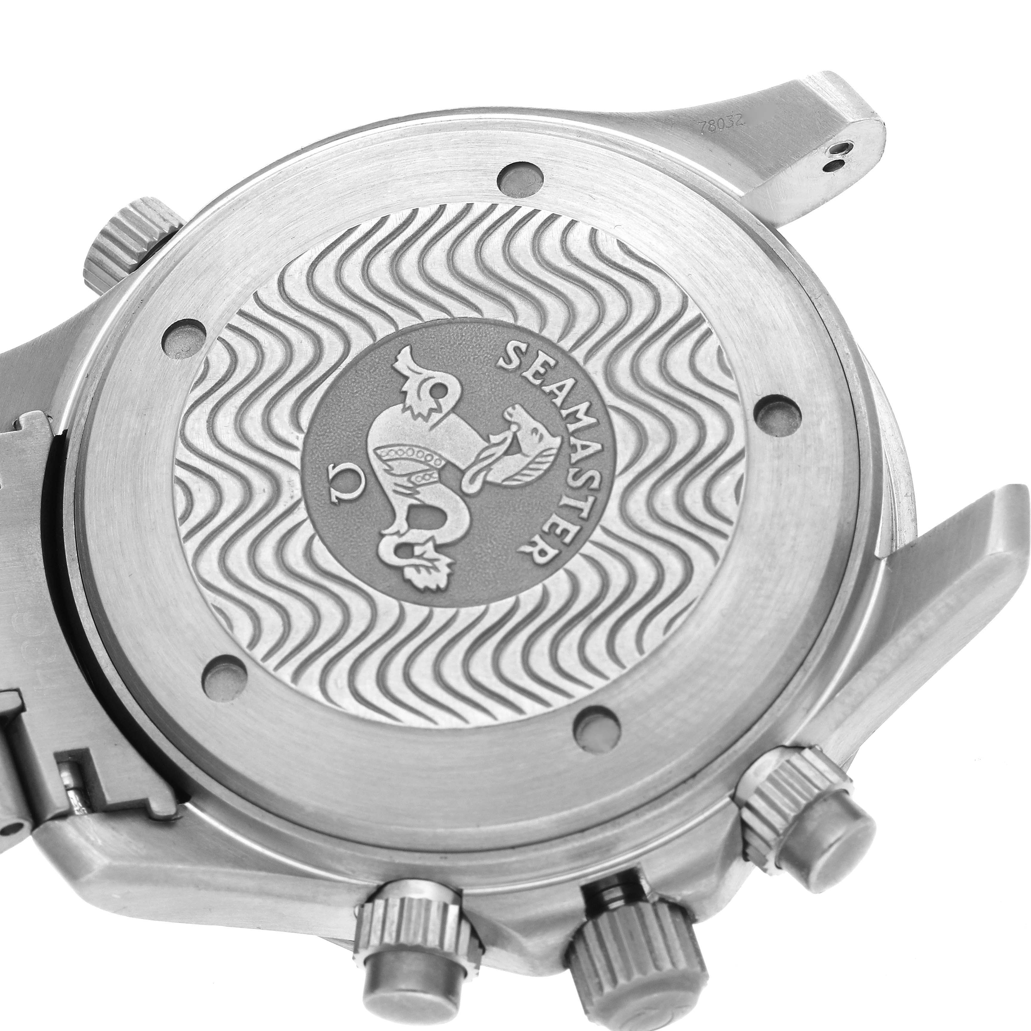 The image shows the engraved case back of the Omega Seamaster 2293.50.00 Men's Titanium Black Dial 2293.50.00 Men's Titanium Black Dial watch, featuring a wavy pattern and emblem.